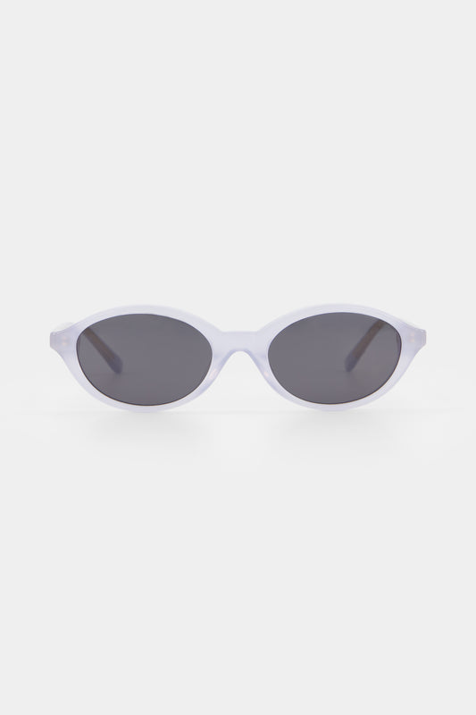 Isle of Eden Mirabel baby blue sunglasses, front view showing sleek oval frame and dark lenses
