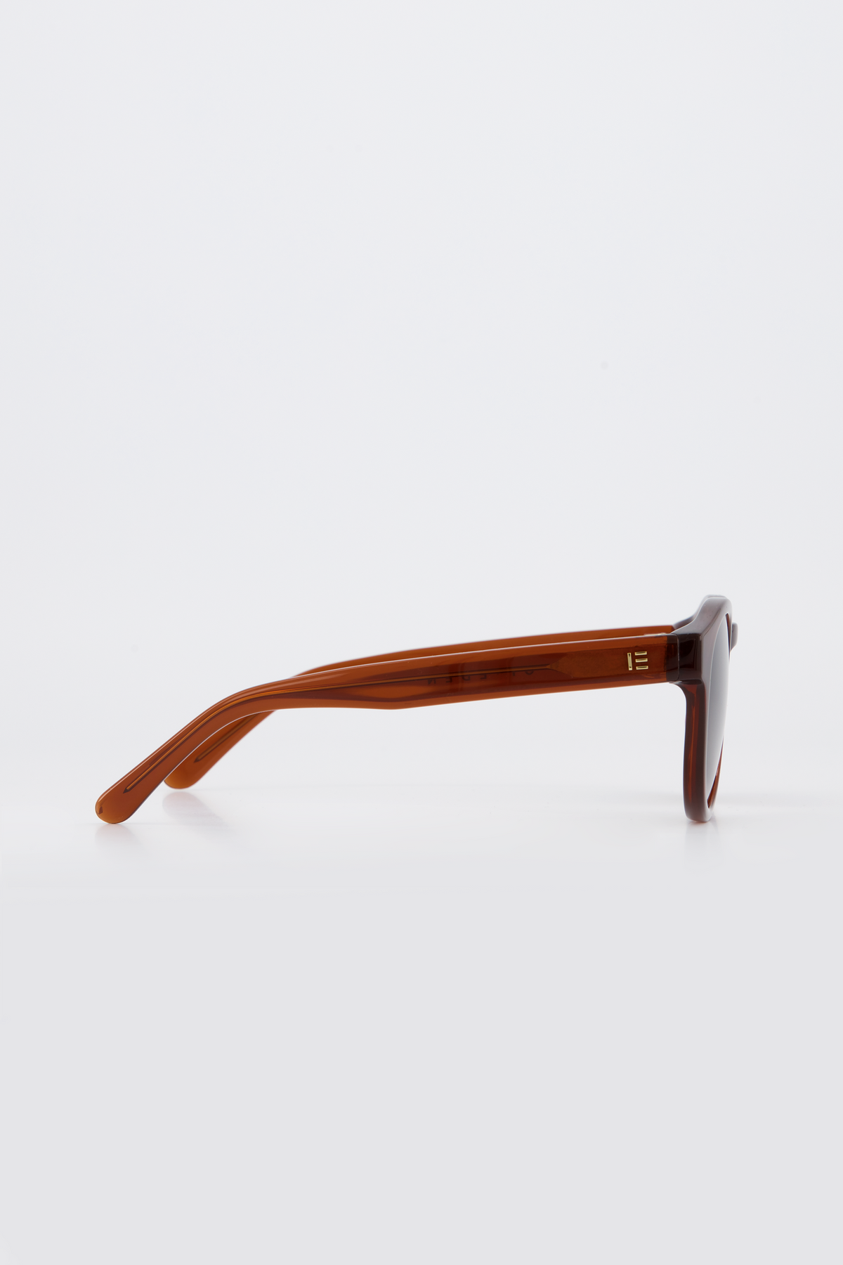 Isle of Eden Eddie brown sunglasses, side profile view showing temple length and hinge detail