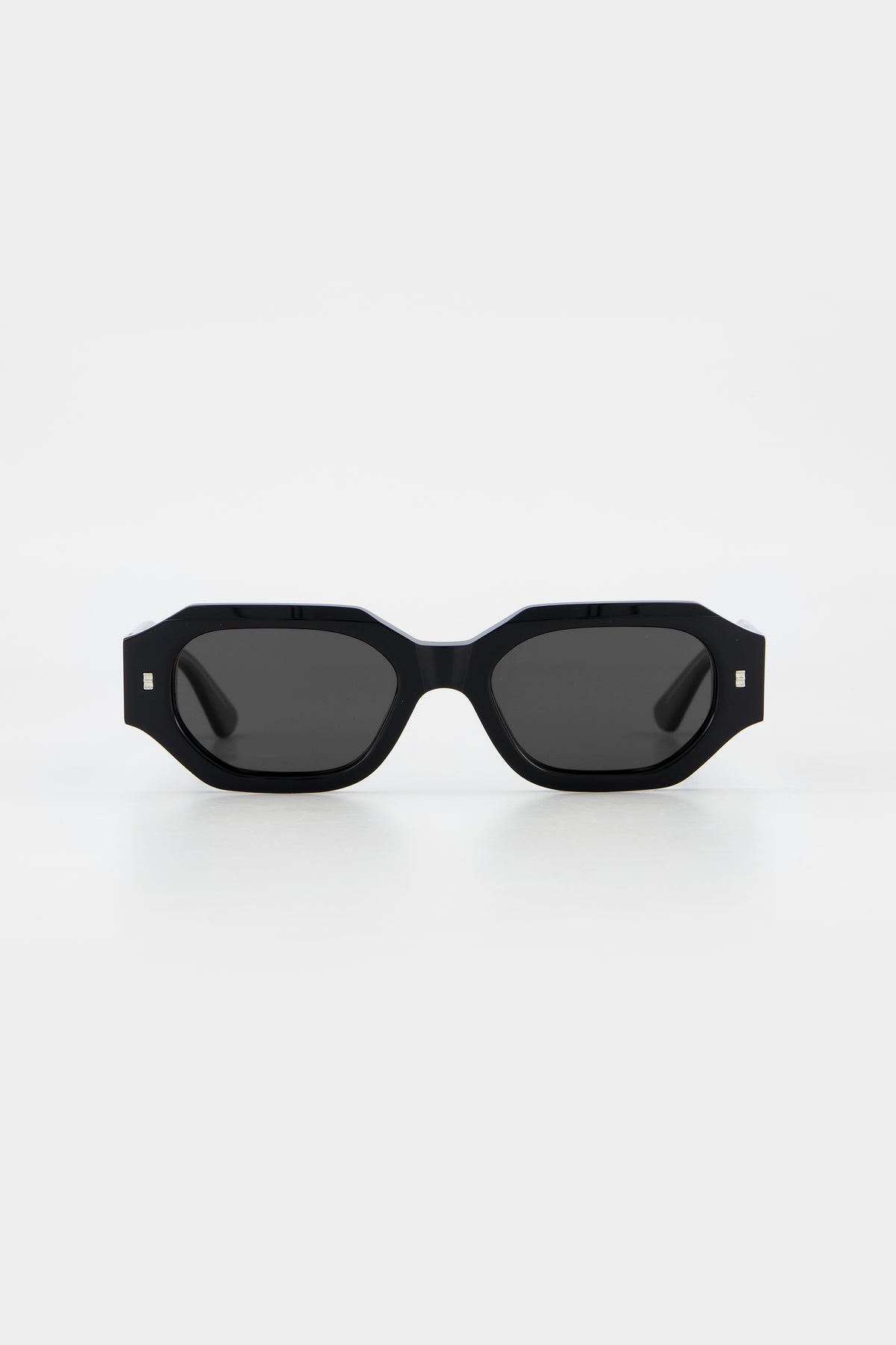 Isle of Eden Blake black sunglasses, front view showing low profile hexagonal frame and black polarised lenses