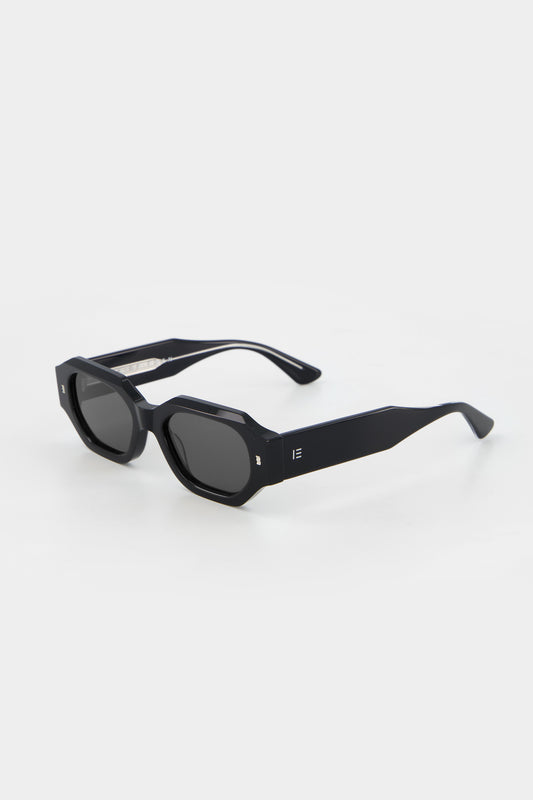 Isle of Eden Blake black sunglasses, three-quarter angle showing low profile hexagonal frame