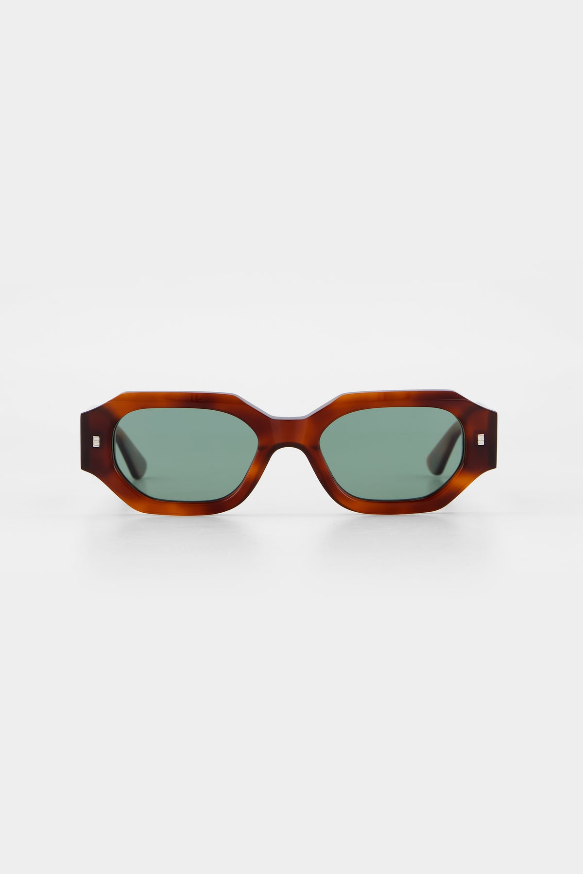 Isle of Eden Blake honey tortoise sunglasses, front view showing hexagonal frame and green lenses