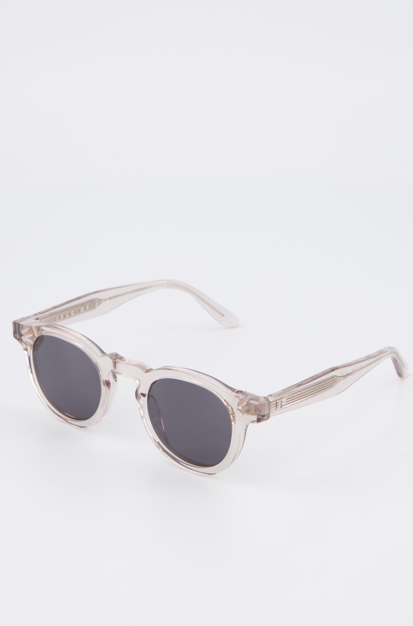Isle of Eden Drew sand sunglasses, angled close-up showing round frame and lens detail