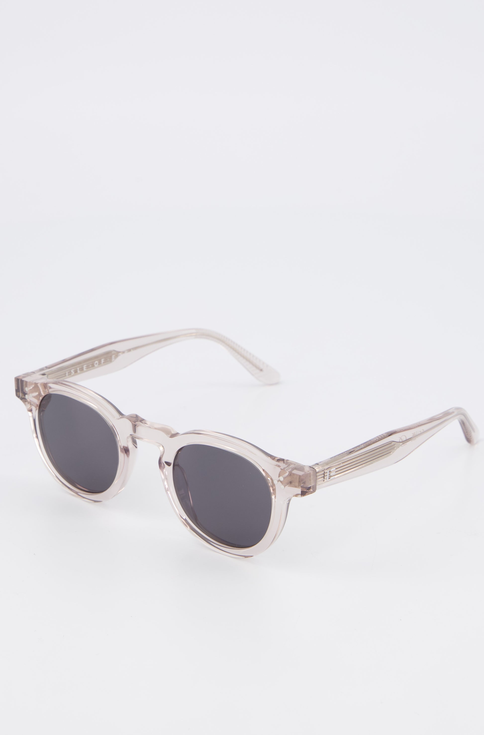 Isle of Eden Drew sand sunglasses, angled close-up showing round frame and lens detail