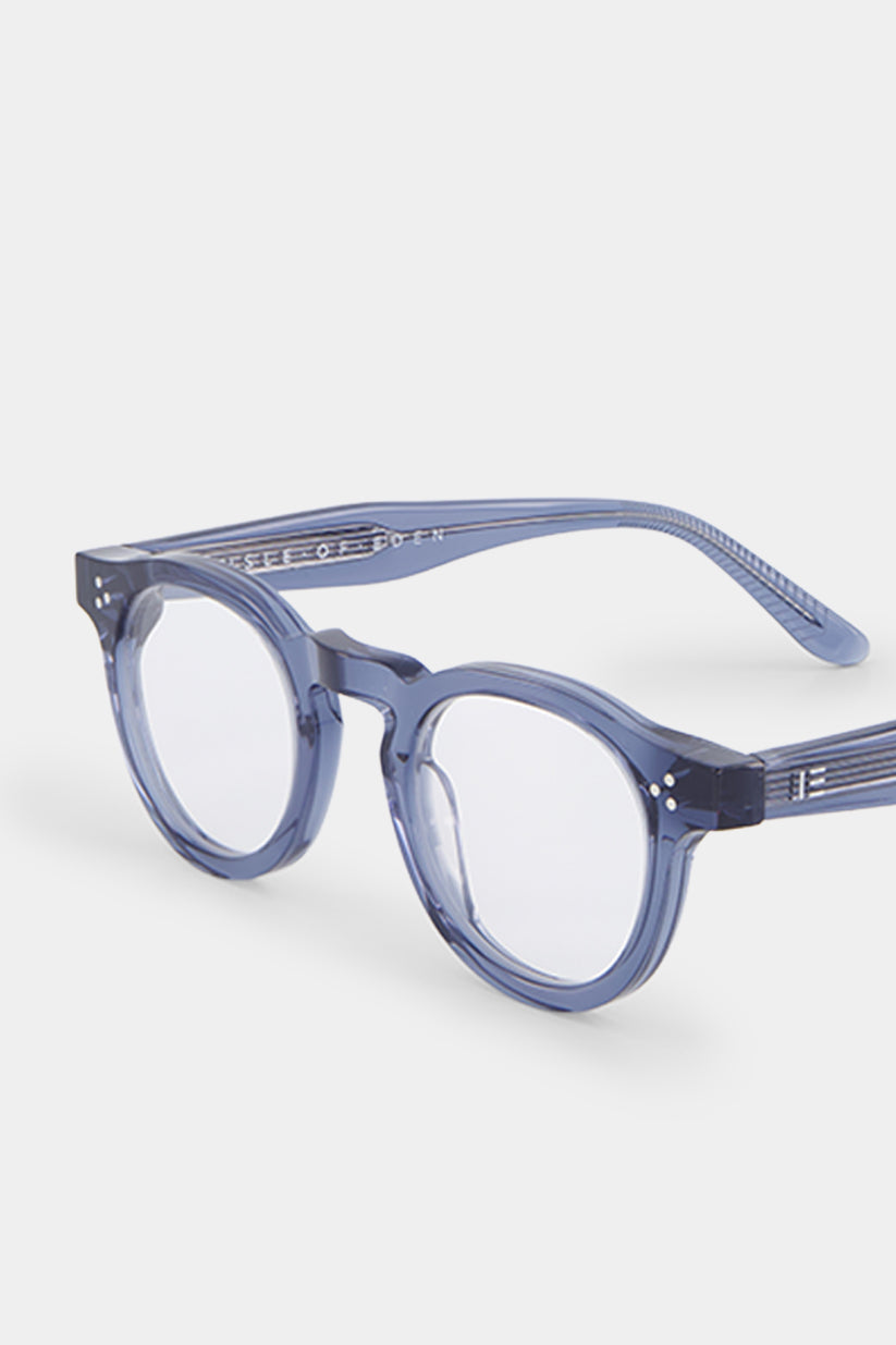 Isle of Eden Drew prescription glasses, angled side view showing the eco-conscious blue bio-acetate frame with brand lettering detail