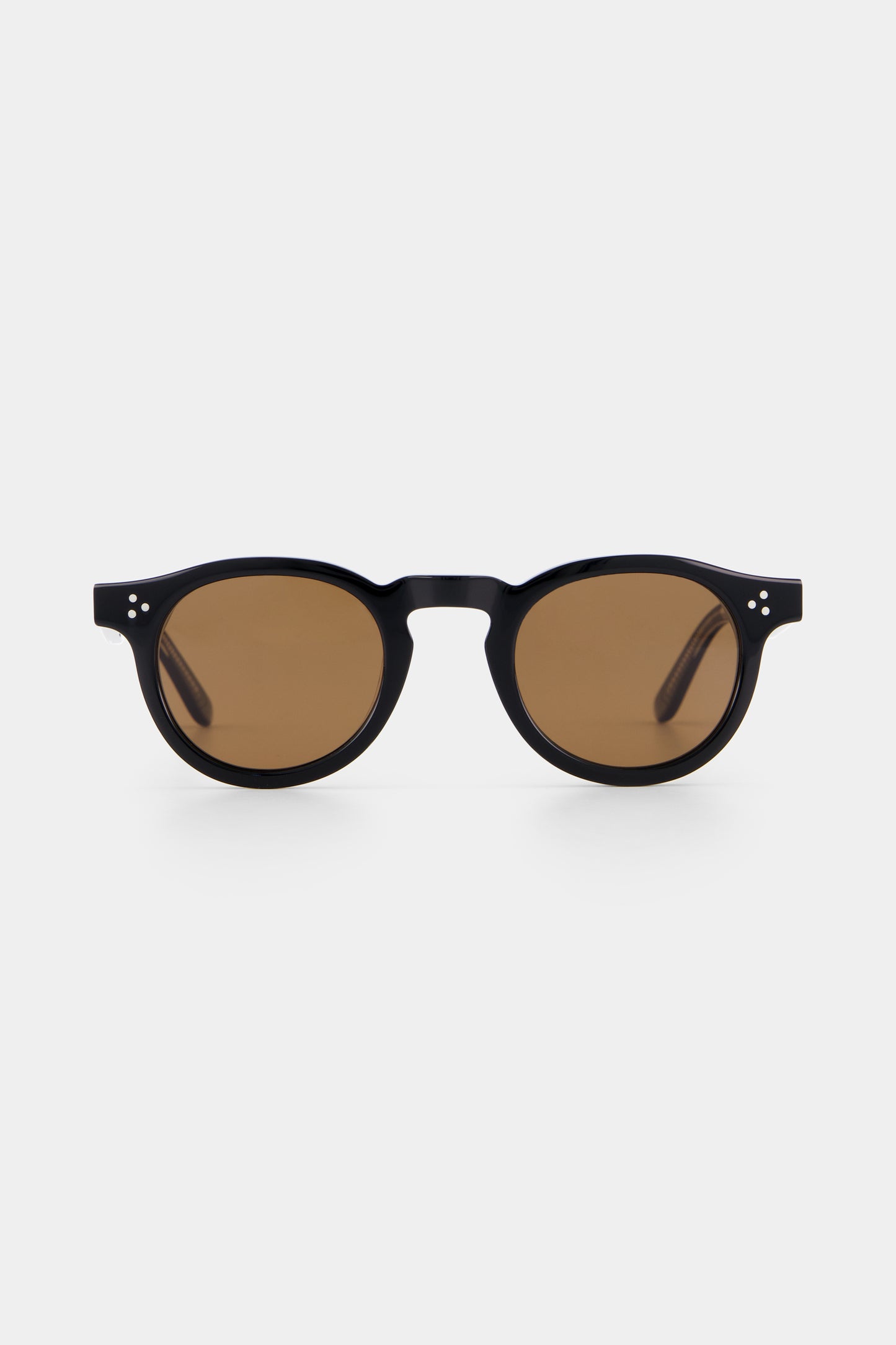 Isle of Eden Drew black sunglasses, front view showing round frame and brown lenses