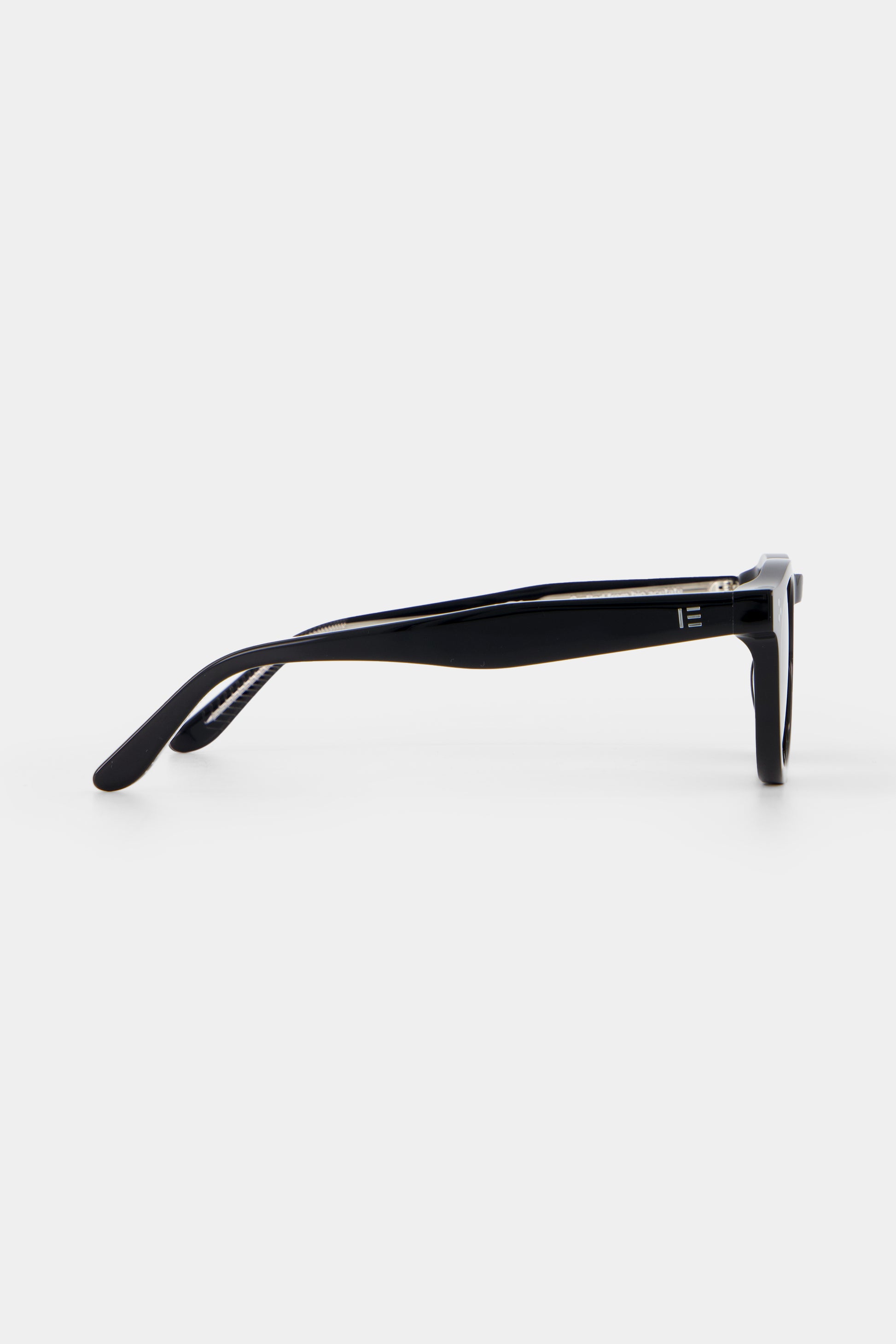 Isle of Eden Drew black sunglasses, side profile view showing temple length and hinge detail