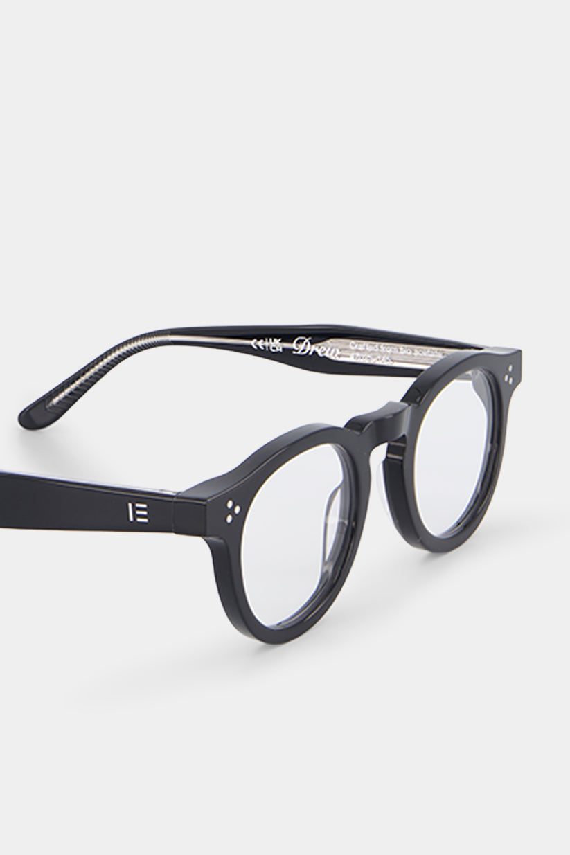 Isle of Eden Drew prescription glasses, angled side view showing the eco-conscious black bio-acetate frame with brand lettering detail