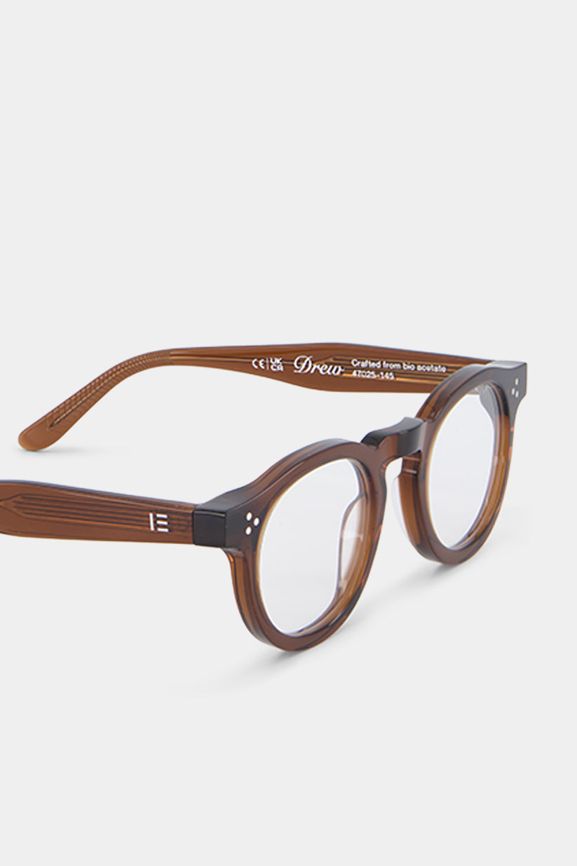 Isle of Eden Drew prescription glasses, angled side view showing the eco-conscious bio-acetate wood-grain frame and hinge detail, designed for everyday vision correction