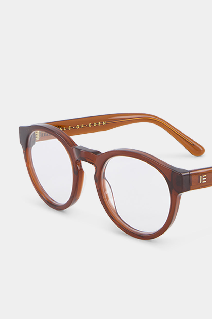 Isle of Eden Eddie prescription glasses, angled side view showing the eco-conscious brown bio-acetate frame with brand lettering detail