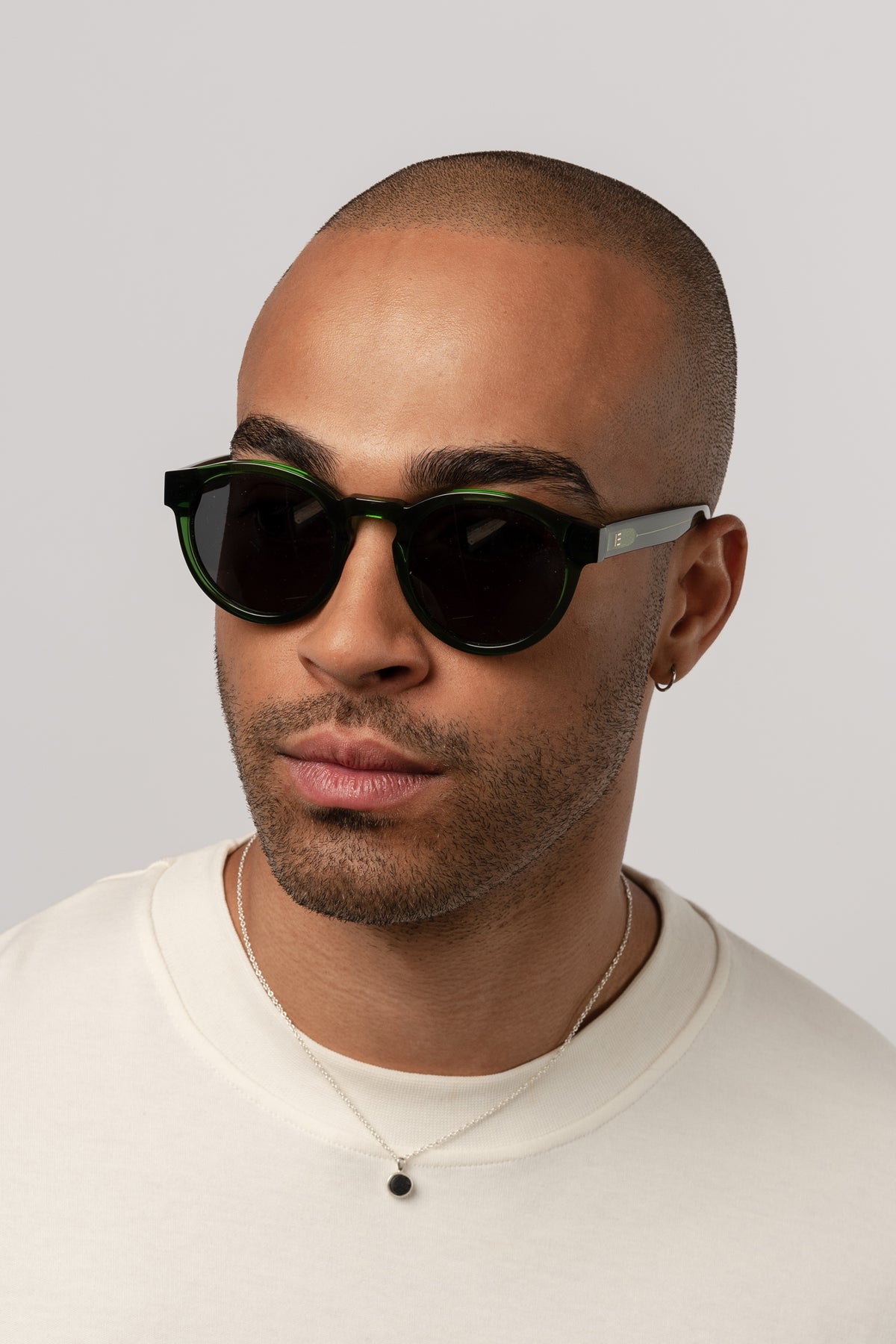 Close-up of a model's face highlighting the comfortable fit of the Isle of Eden Eddie Green Prescription frames.