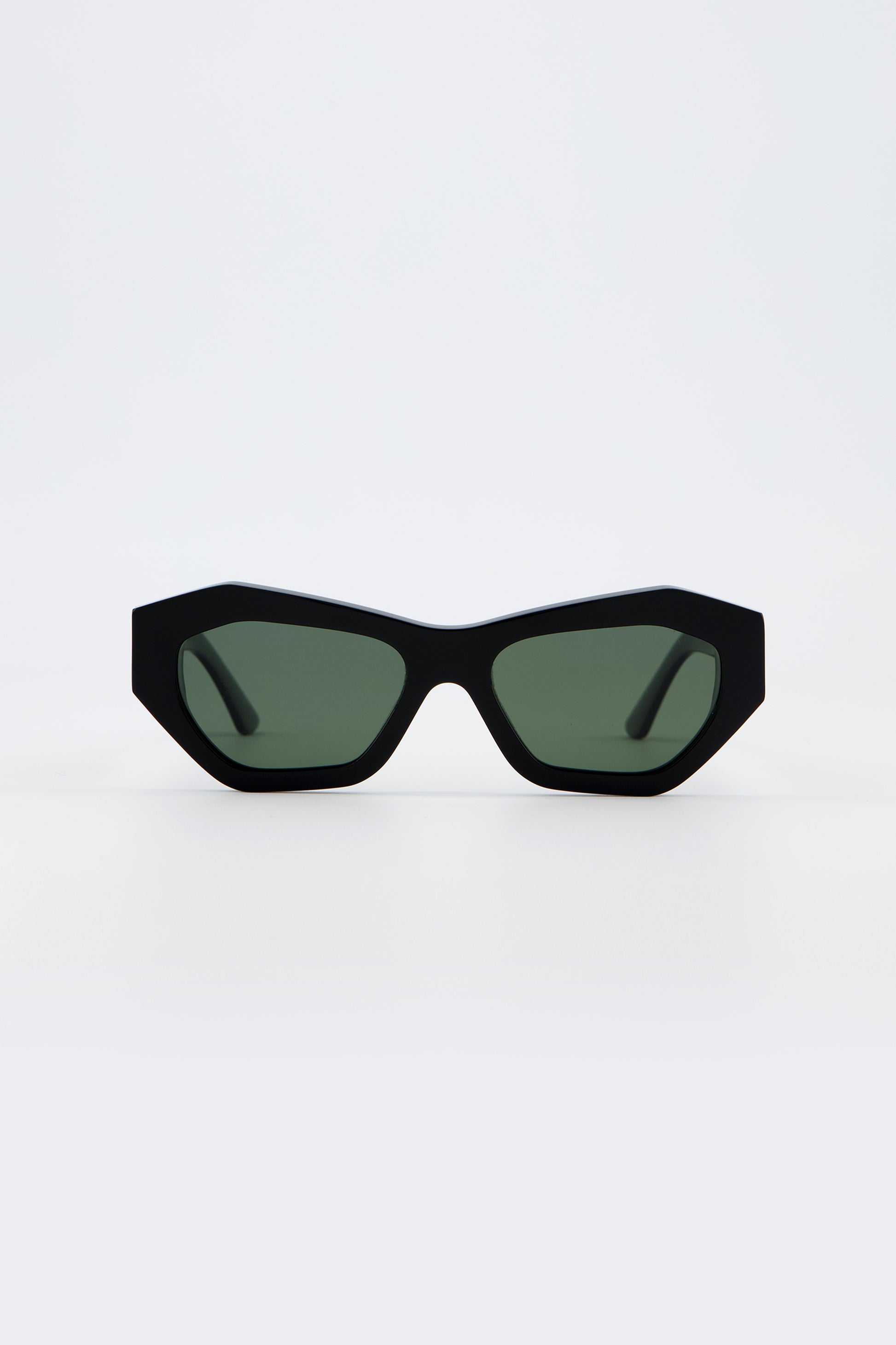 Isle of Eden Emily black sunglasses, front view showing angular cat-eye frame and green lenses