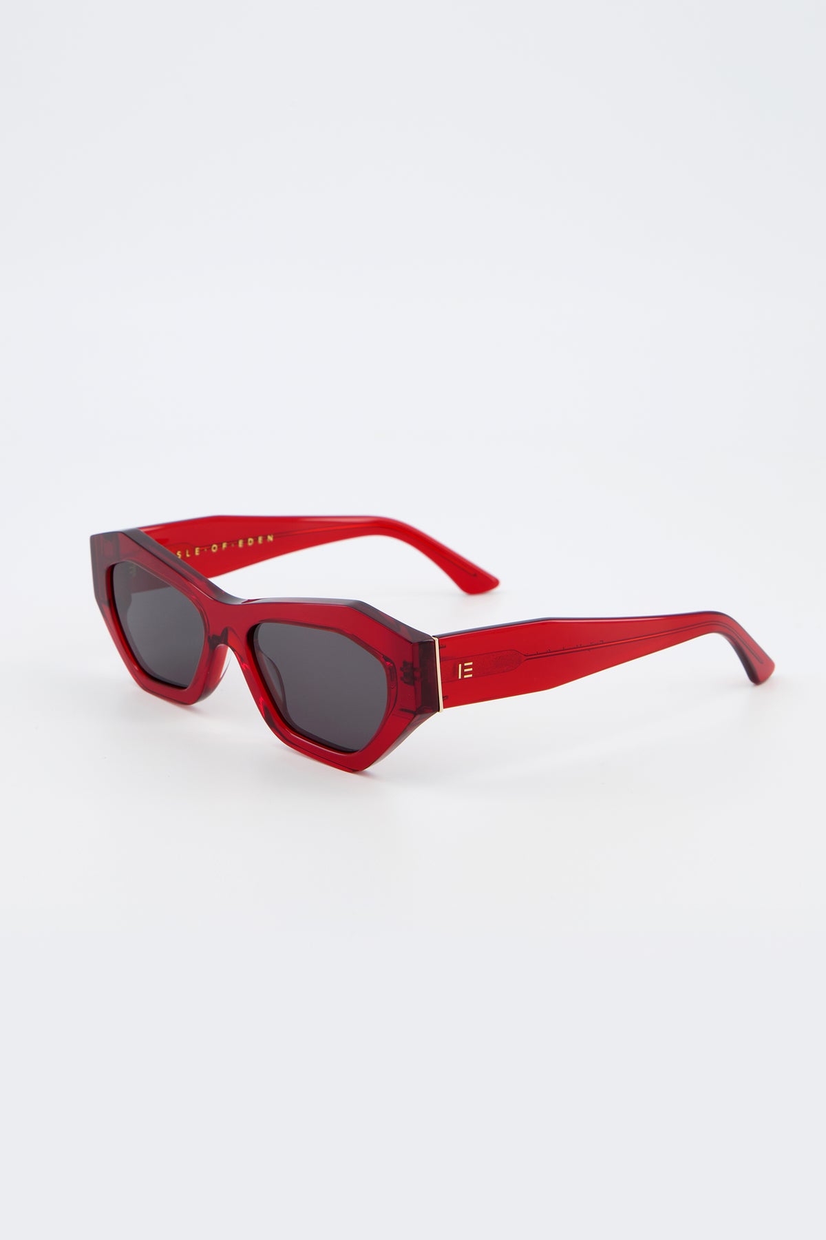 Isle of Eden Emily red sunglasses, three-quarter angle showing angular cat-eye frame
