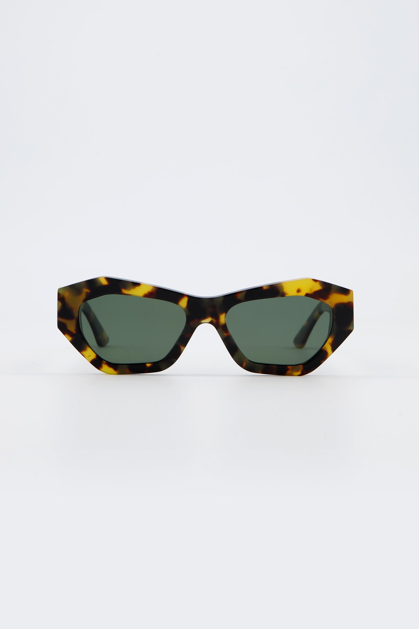 Isle of Eden Emily tortoise sunglasses, front view showing angular cat-eye frame and green lenses