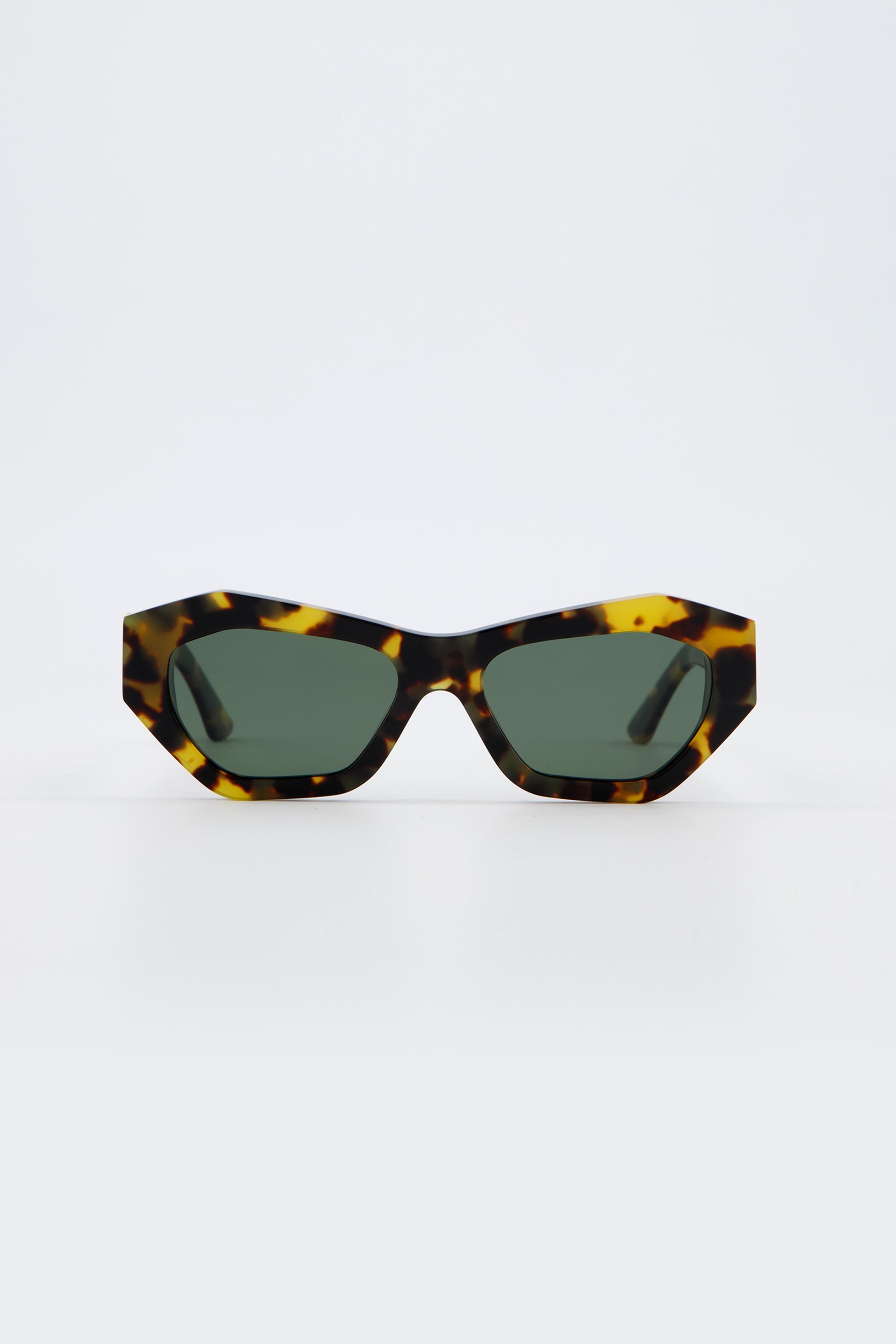 Isle of Eden Emily tortoise sunglasses, front view showing angular cat-eye frame and green lenses