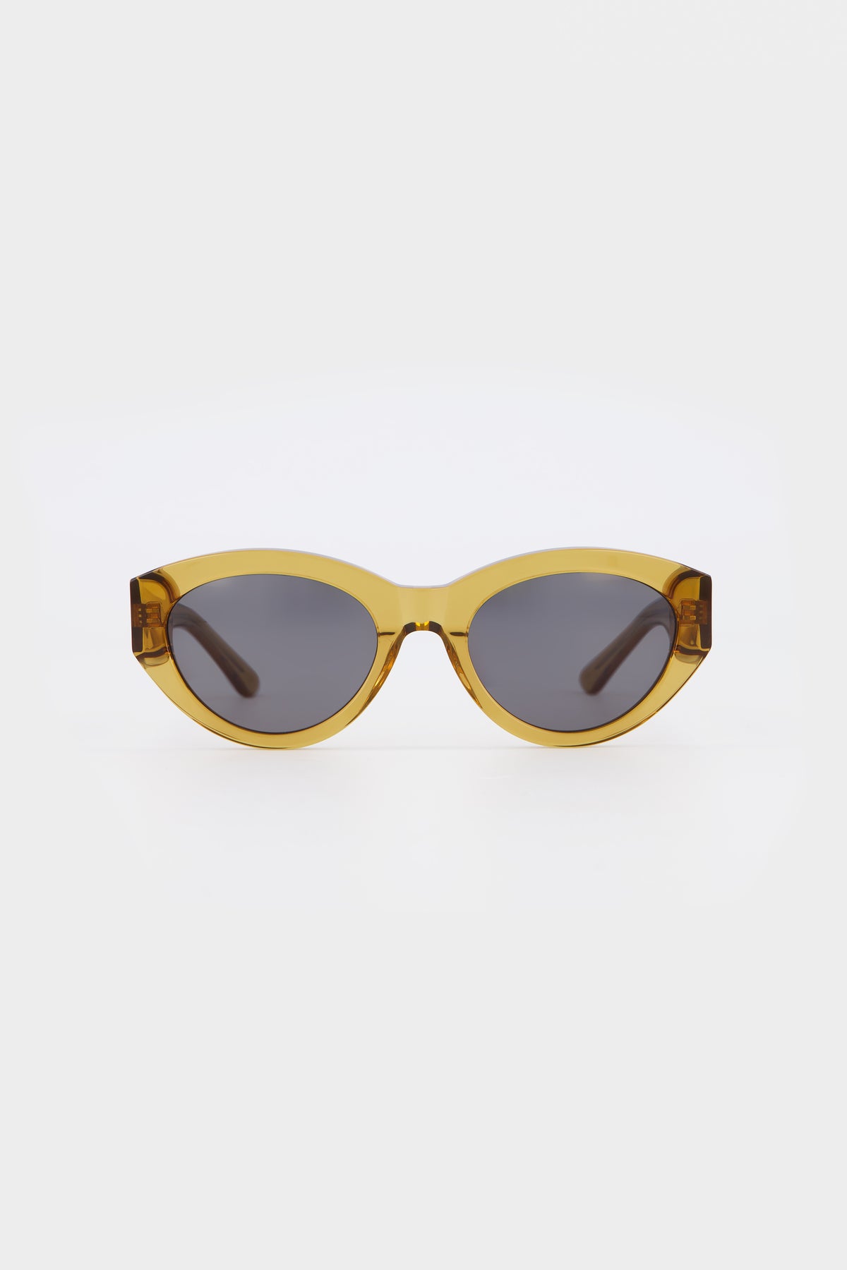 Isle of Eden Felina cognac sunglasses, front view showing cat-eye frame and dark lenses