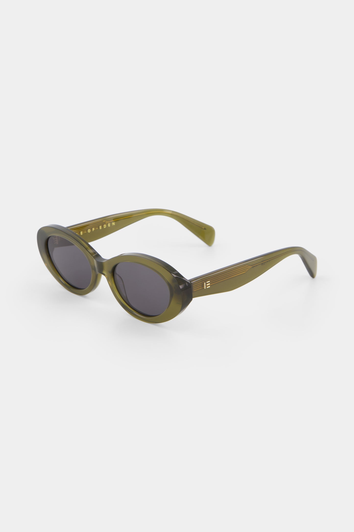 Isle of Eden Frankie frosted green sunglasses, three-quarter angle showing curvy oval frame