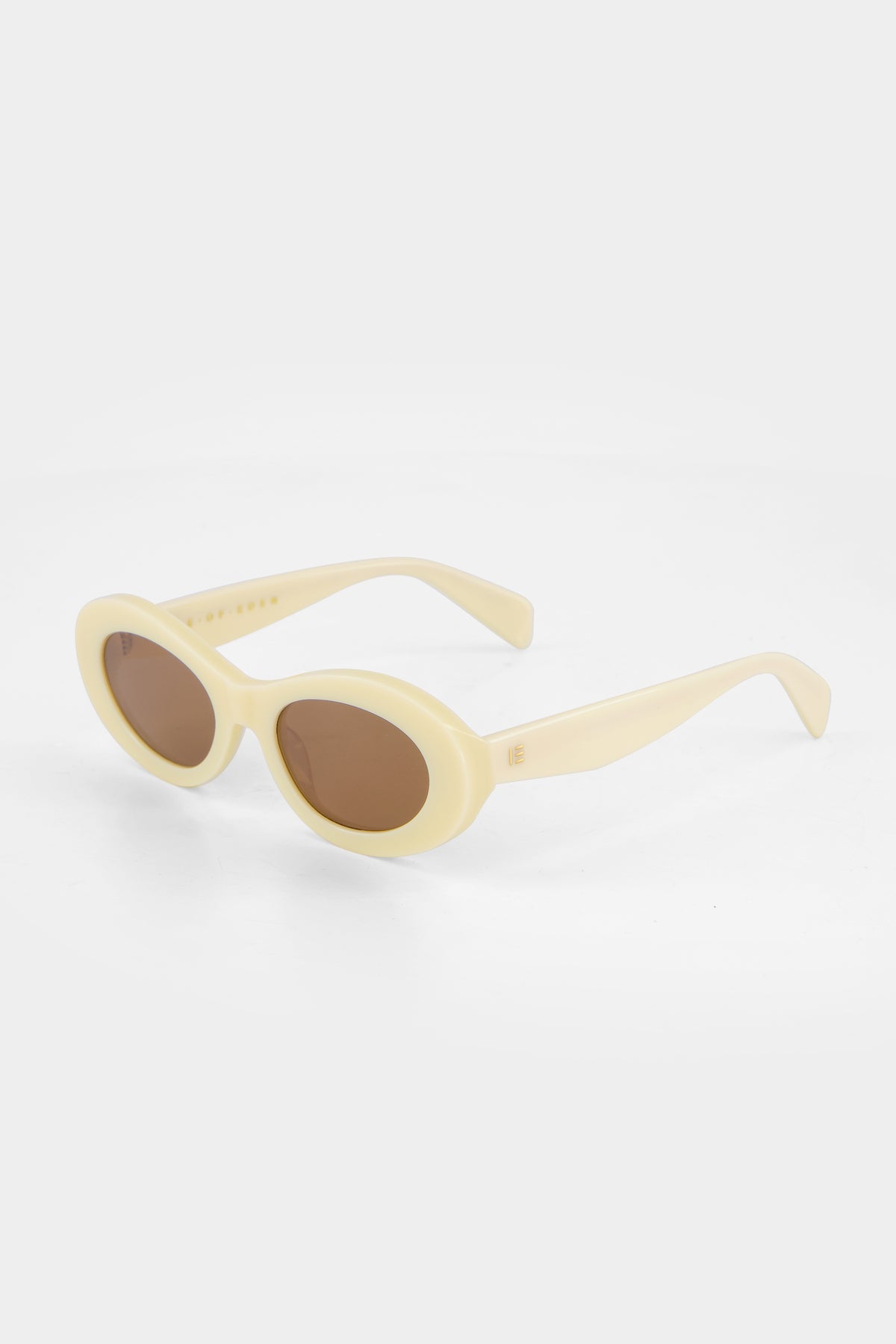 Isle of Eden Frankie ivory sunglasses, three-quarter angle showing curvy oval frame