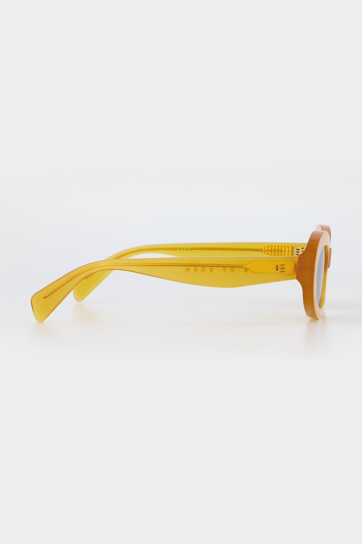 Isle of Eden Frankie yellow sunglasses, side profile view showing temple length and hinge detail