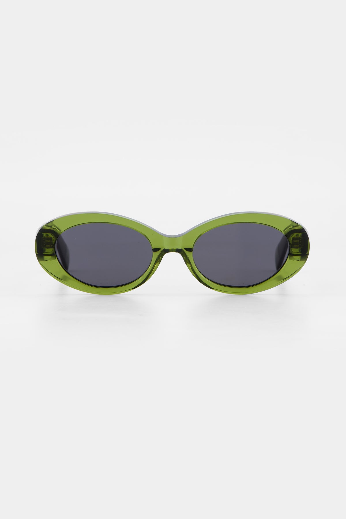 Isle of Eden Frankie bottle green sunglasses, front view showing curvy oval frame and dark lenses