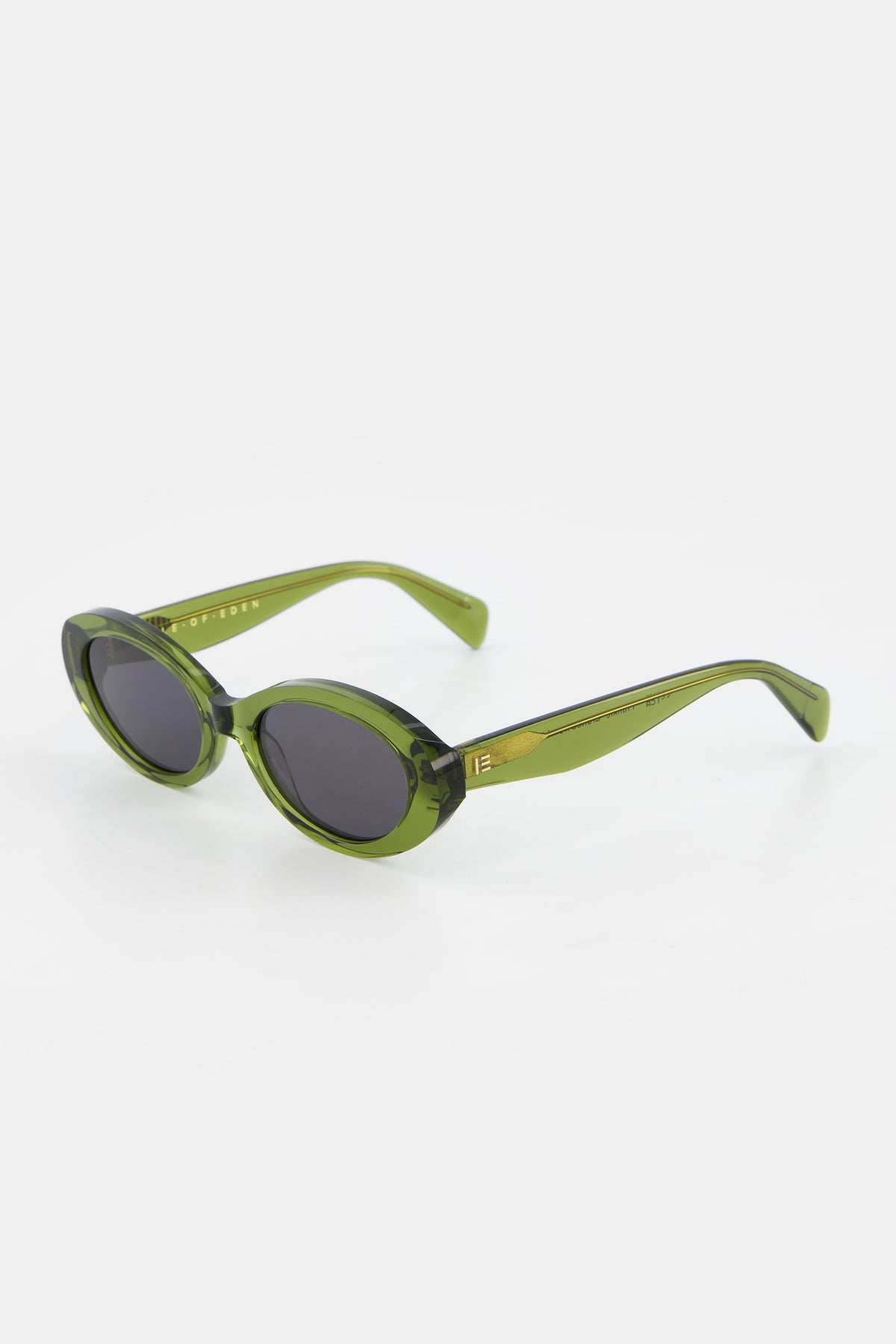 Isle of Eden Frankie bottle green sunglasses, three-quarter angle showing curvy oval frame