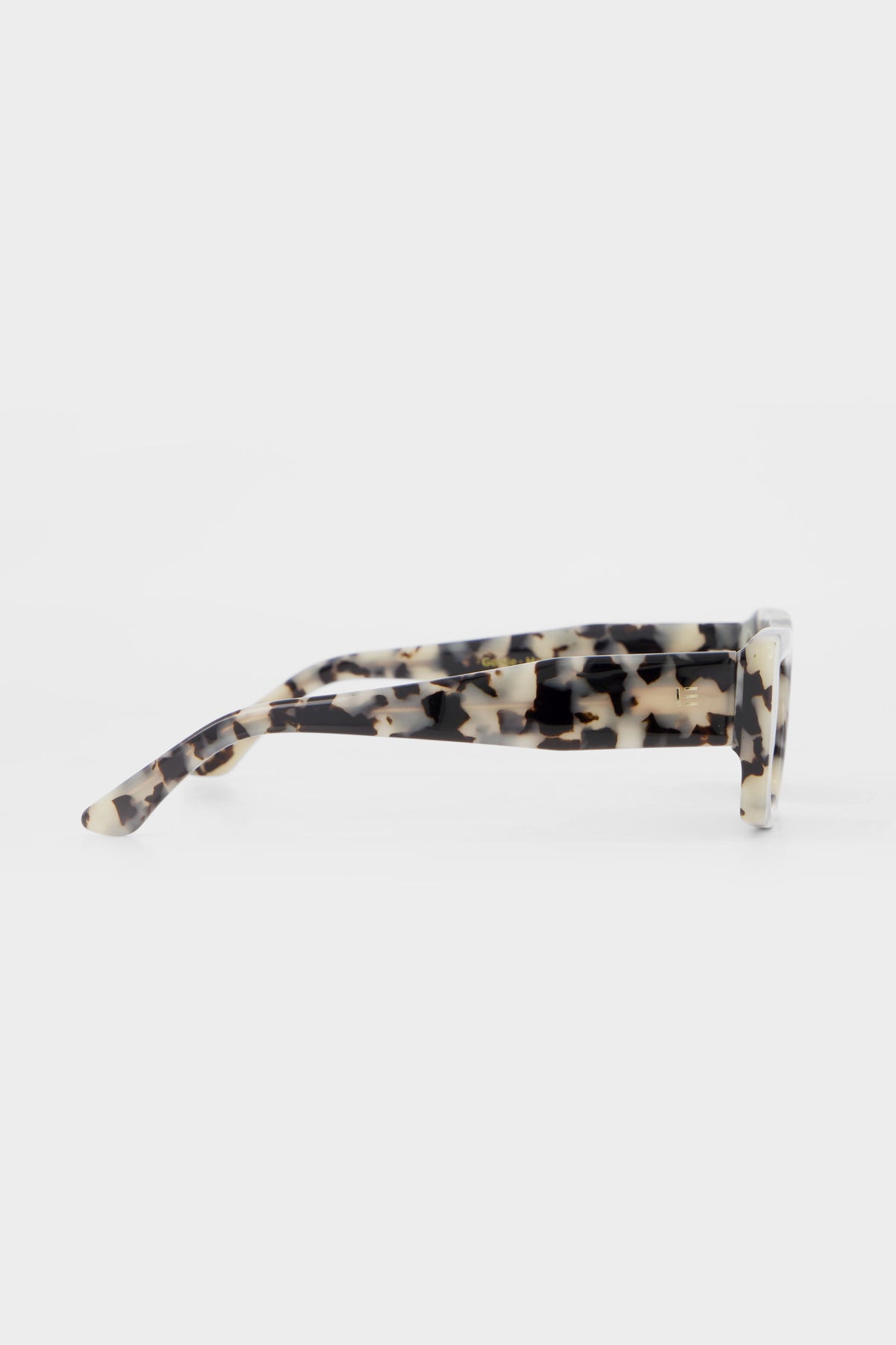 Isle of Eden Goldie white tortoise sunglasses, side profile view showing temple length and hinge detail