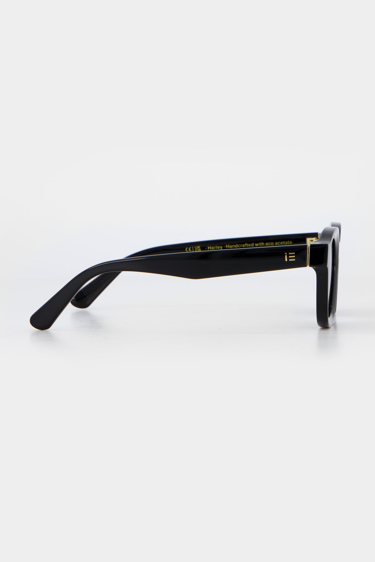 Isle of Eden Harley black sunglasses, side profile view showing temple length and hinge detail