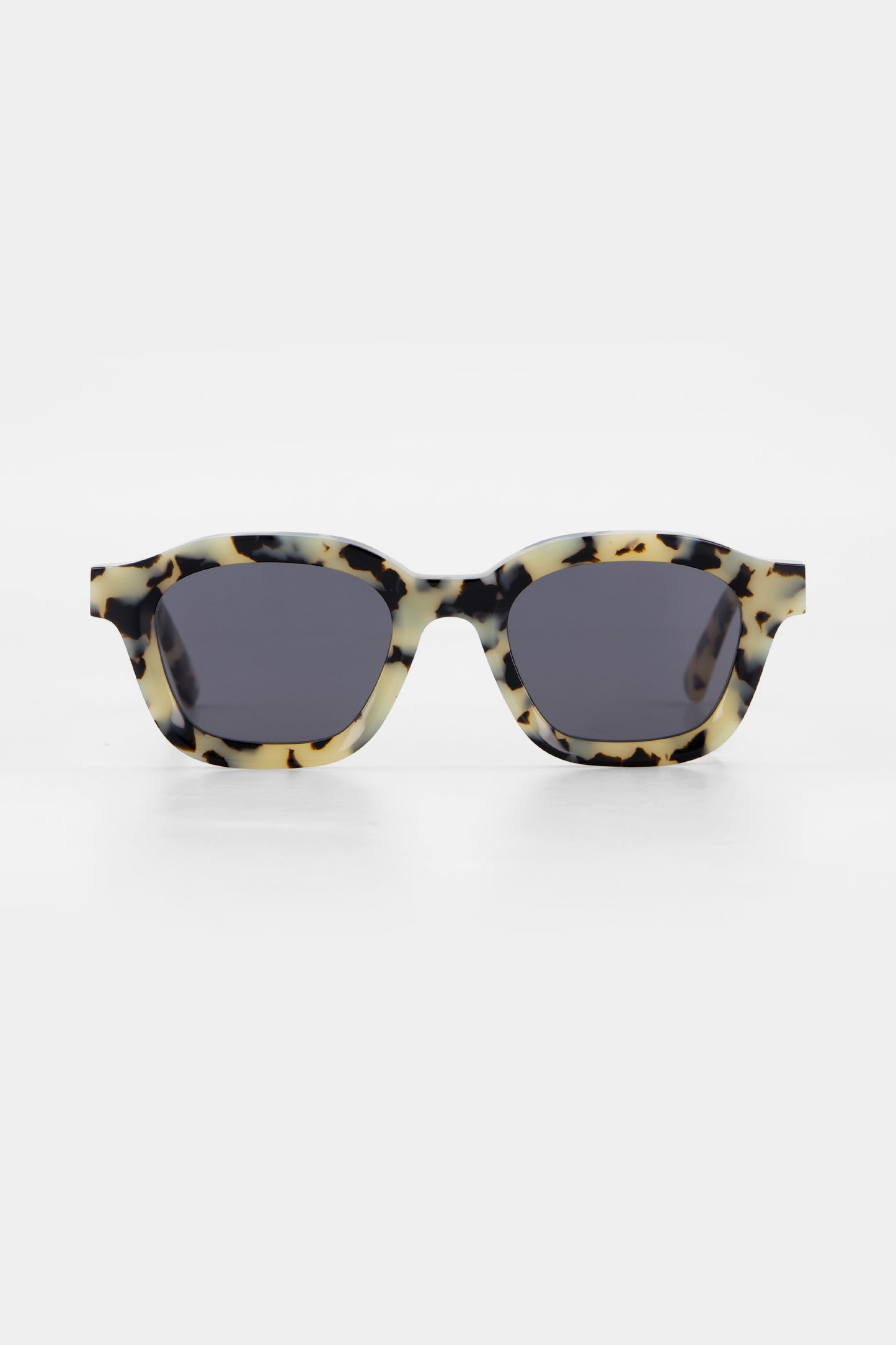 Isle of Eden Harley white tortoise sunglasses, front view showing bold frame and dark lenses