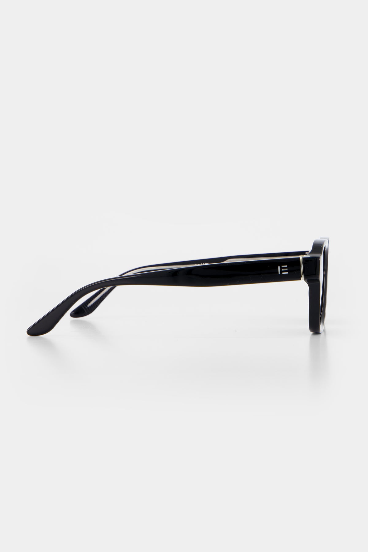 Isle of Eden Jamie black sunglasses, side profile view showing temple length and hinge detail