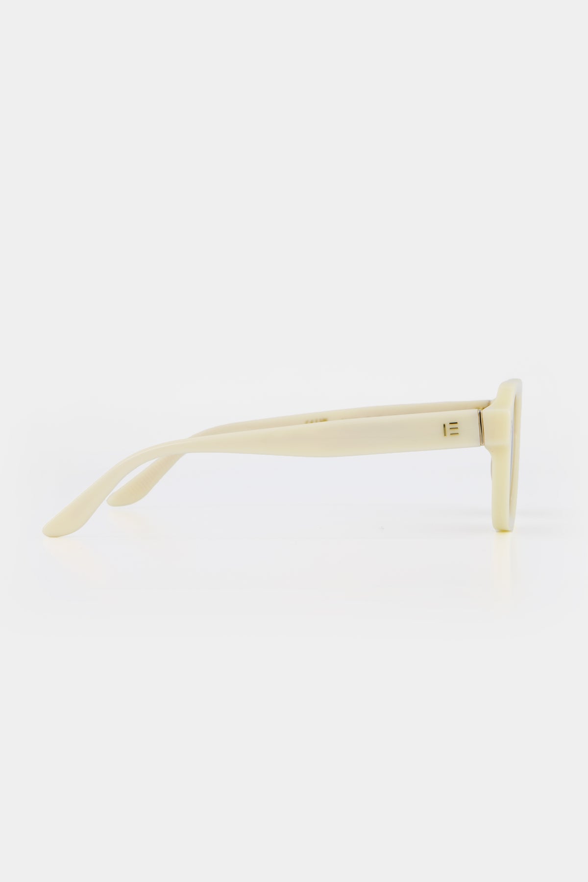 Isle of Eden Jamie ivory sunglasses, side profile view showing temple length and hinge detail