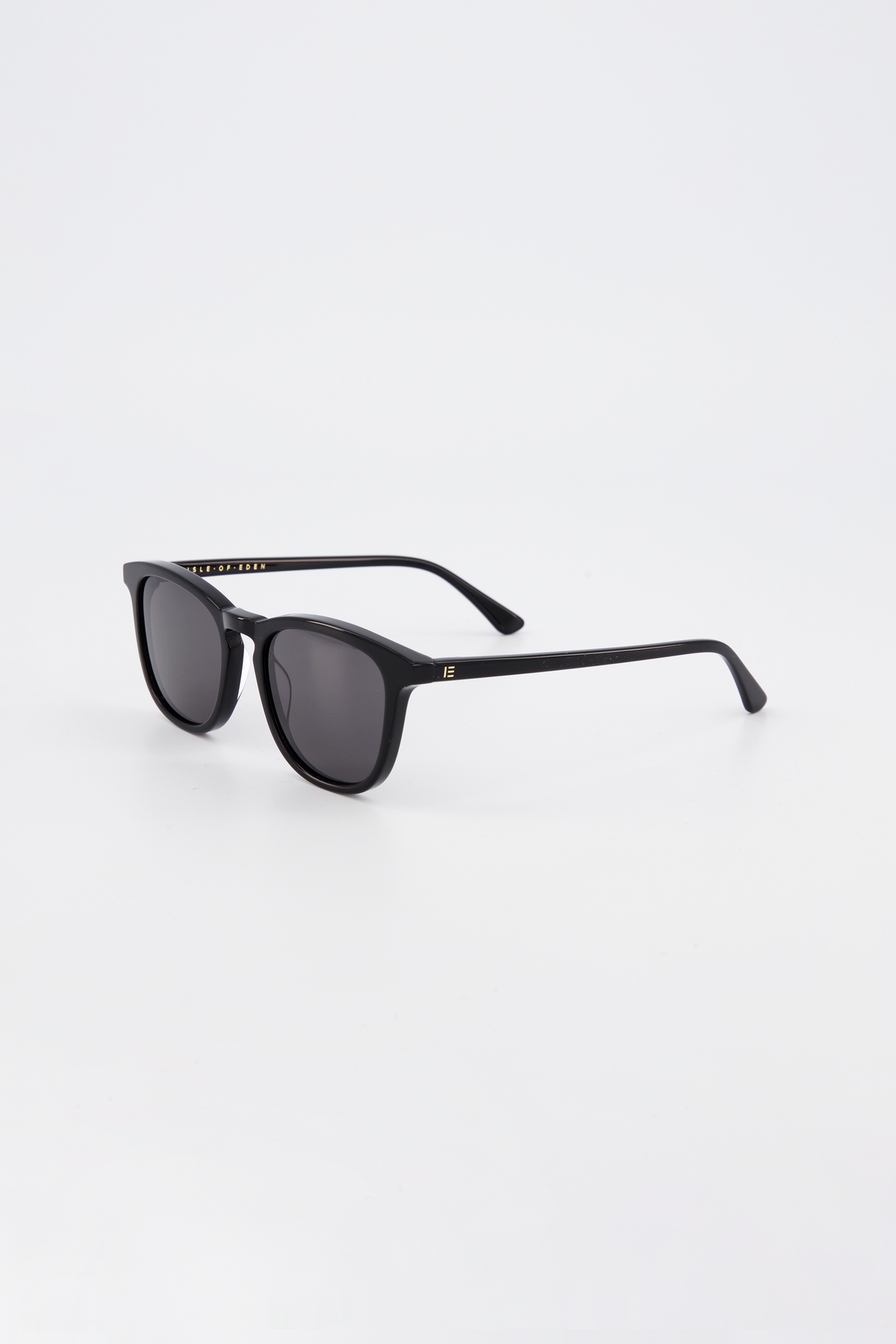 Isle of Eden Louis-Philippe black sunglasses, three-quarter angle showing round bio-acetate frame