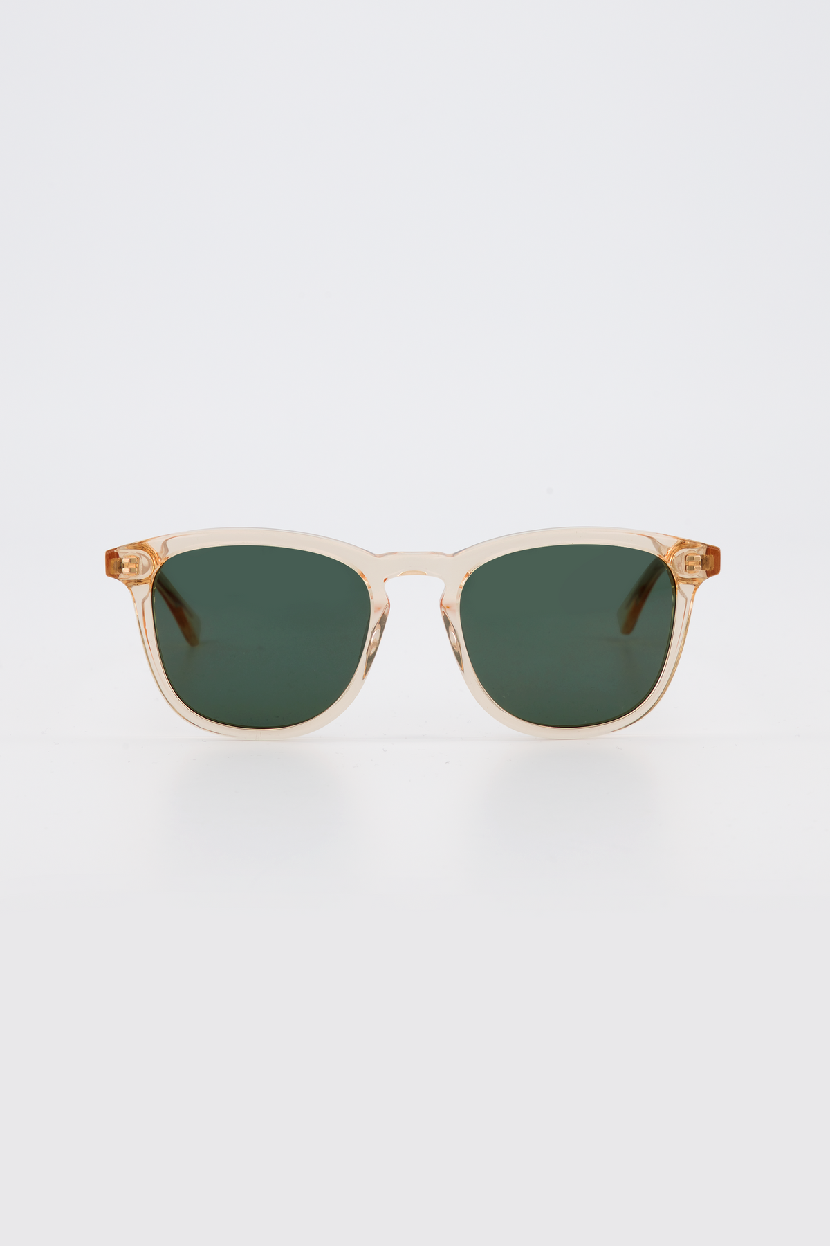 Isle of Eden Louis-Philippe champagne sunglasses, front view showing round bio-acetate frame and green lenses