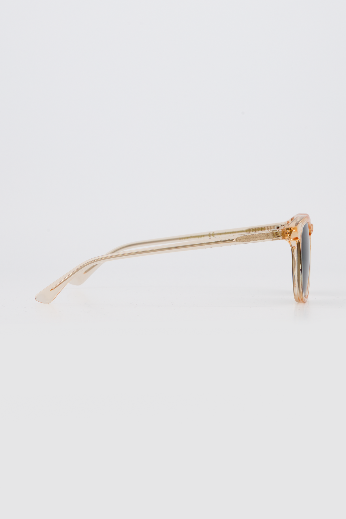 Side profile of Isle of Eden Louis-Philippe sunglasses in champagne bio-acetate, showing temple arm detail