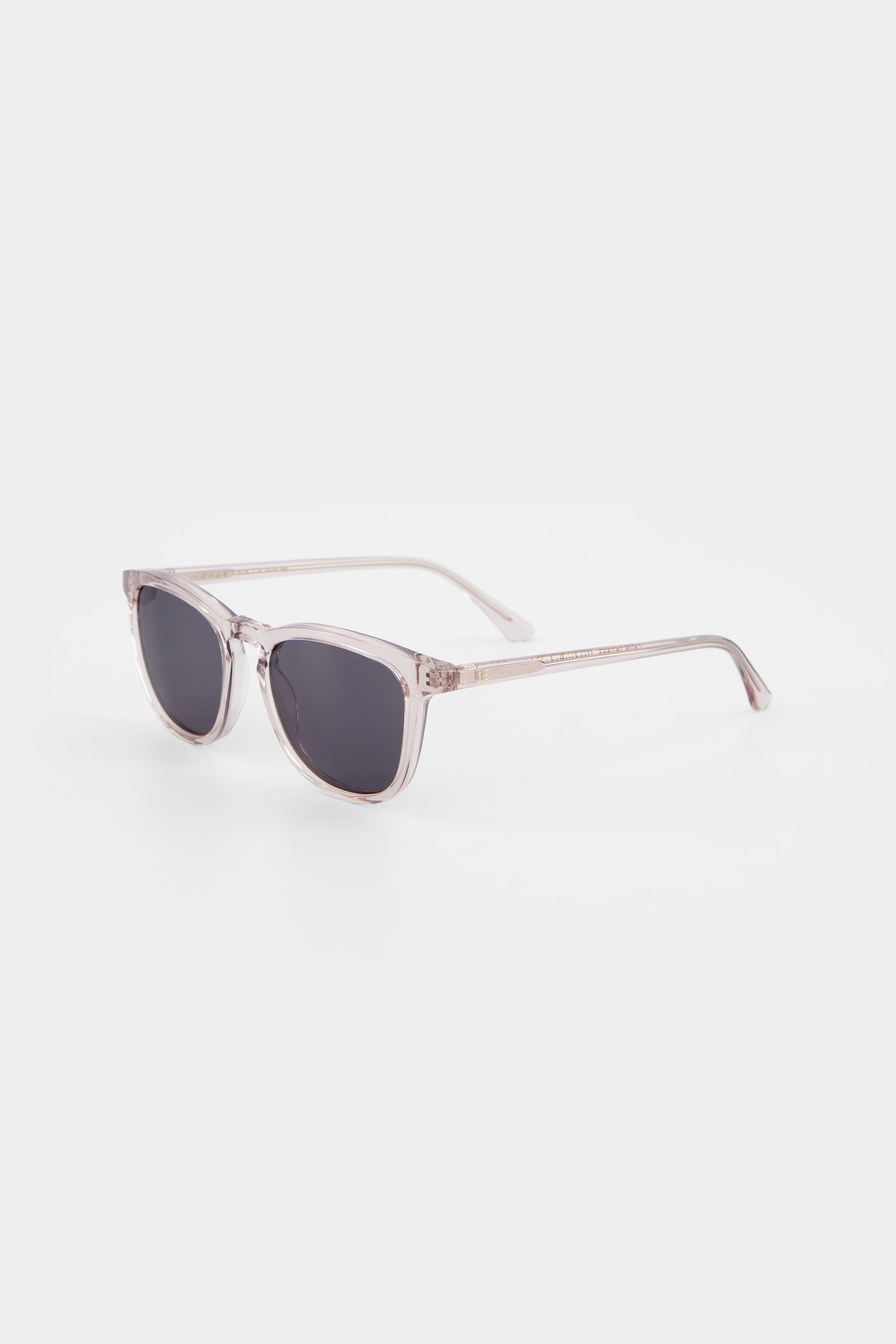 Isle of Eden Louis-Philippe sand sunglasses, three-quarter angle showing translucent bio-acetate frame