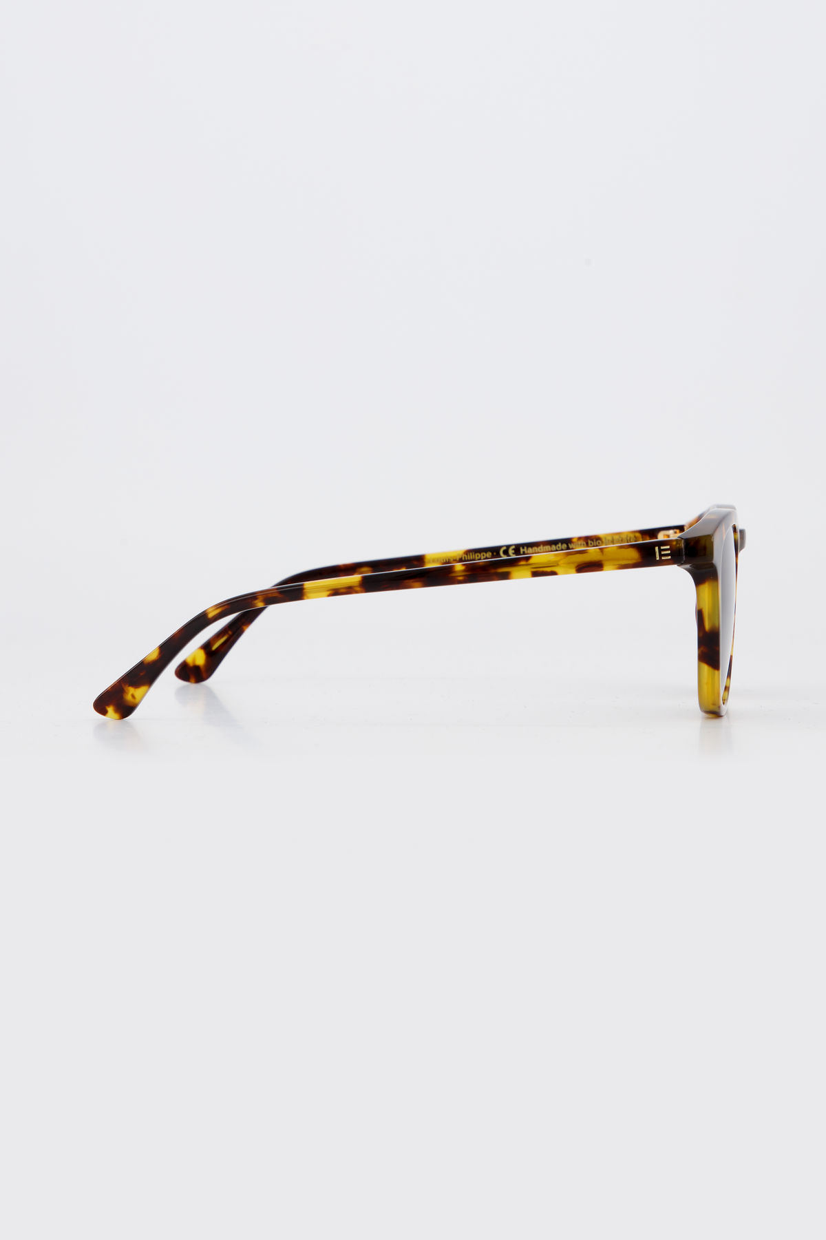 Side profile of Isle of Eden Louis-Philippe sunglasses in tortoiseshell bio-acetate, showing temple arm detail