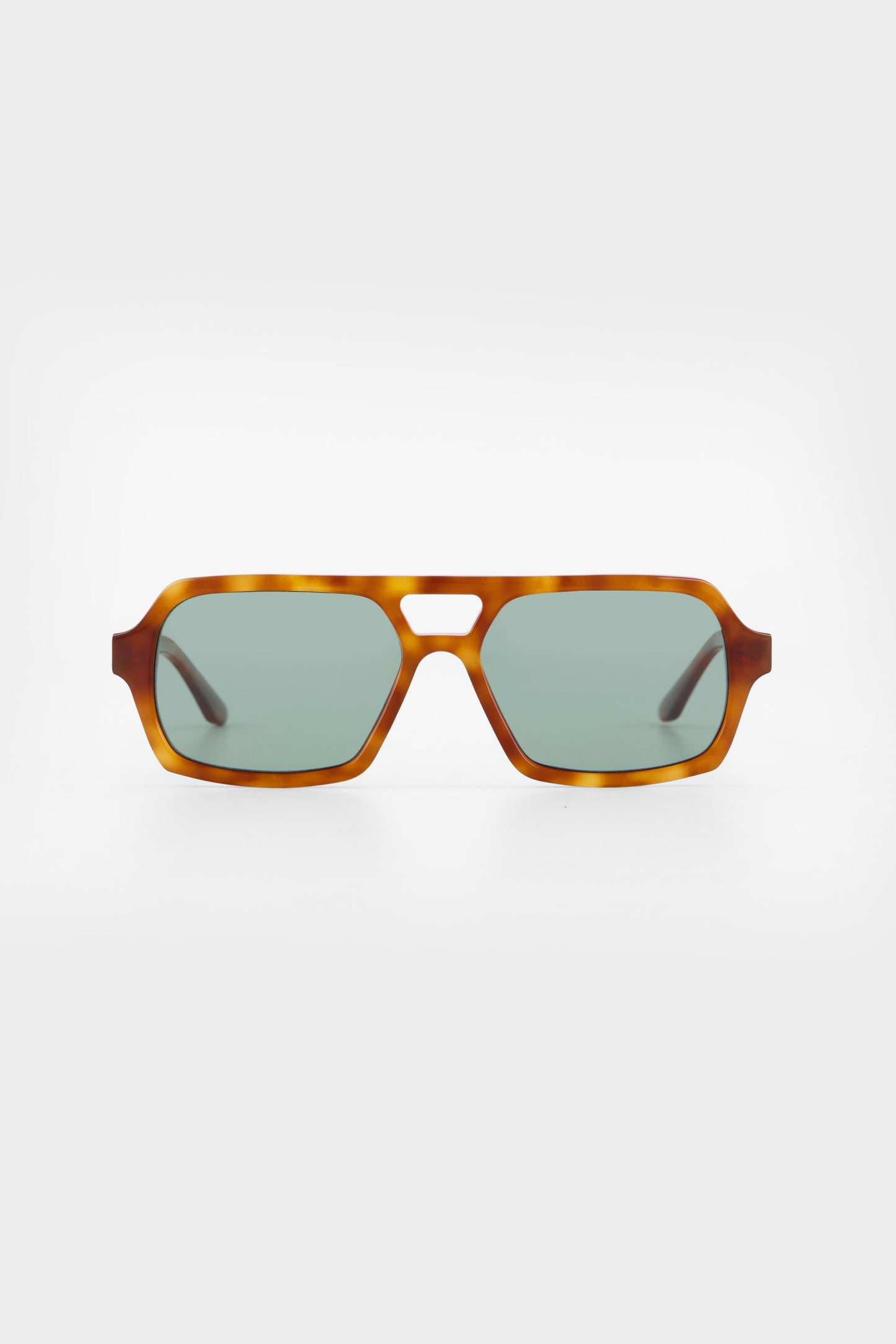 Isle of Eden Lola honey tortoise sunglasses, front view showing aviator frame and green lenses