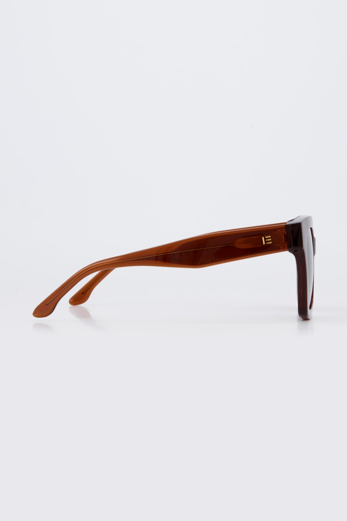 Isle of Eden Maleika brown sunglasses, side profile view showing temple length and hinge detail