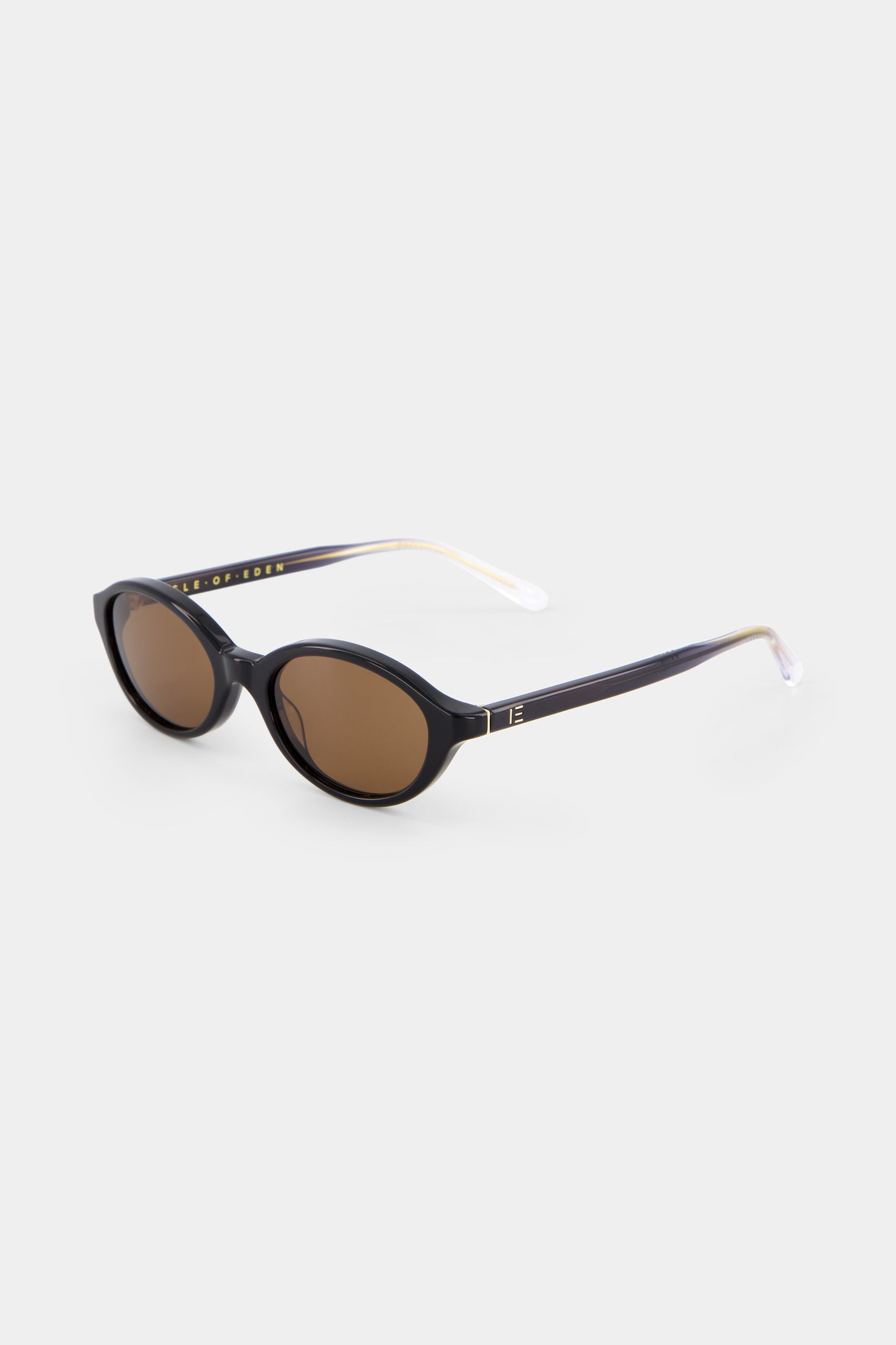 Isle of Eden Mirabel black sunglasses, three-quarter angle showing sleek oval frame