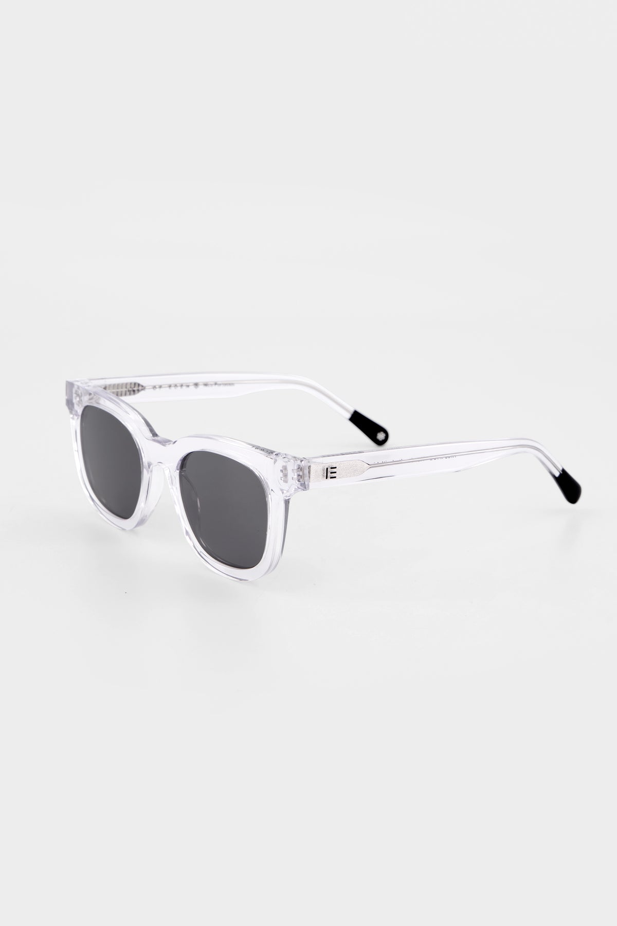 Isle of Eden Nico Sun crystal sunglasses, three-quarter angle showing flat brow square frame