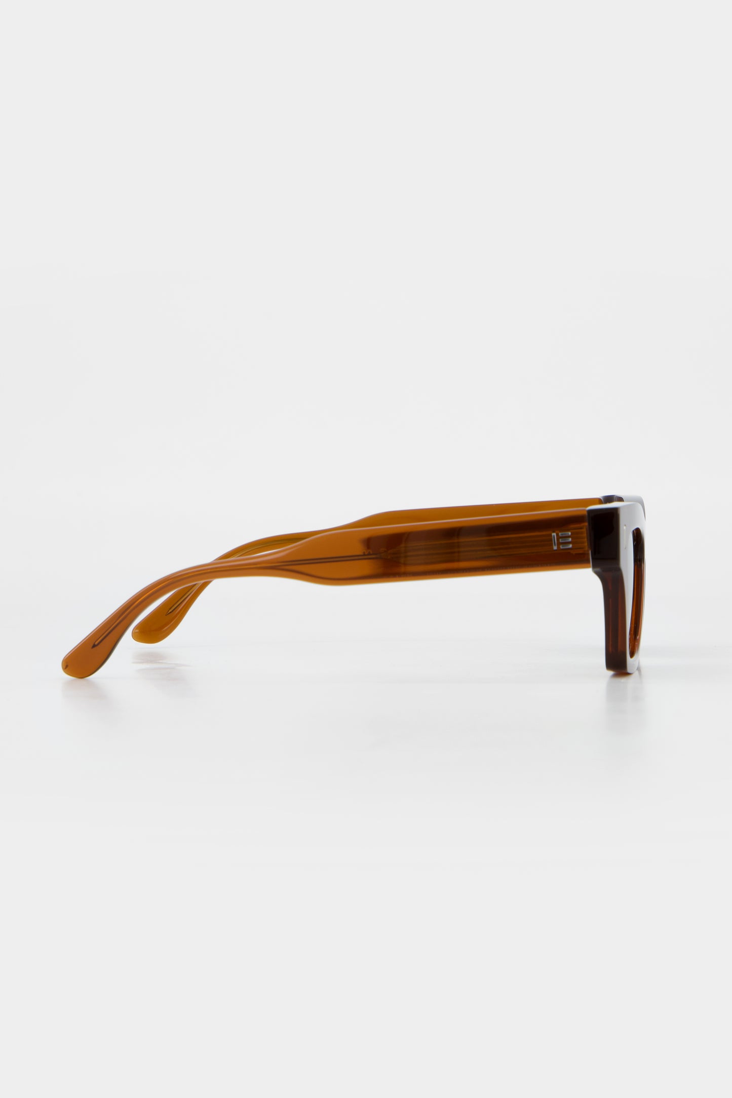 Isle of Eden Olli brown sunglasses, side profile view showing temple length and hinge detail