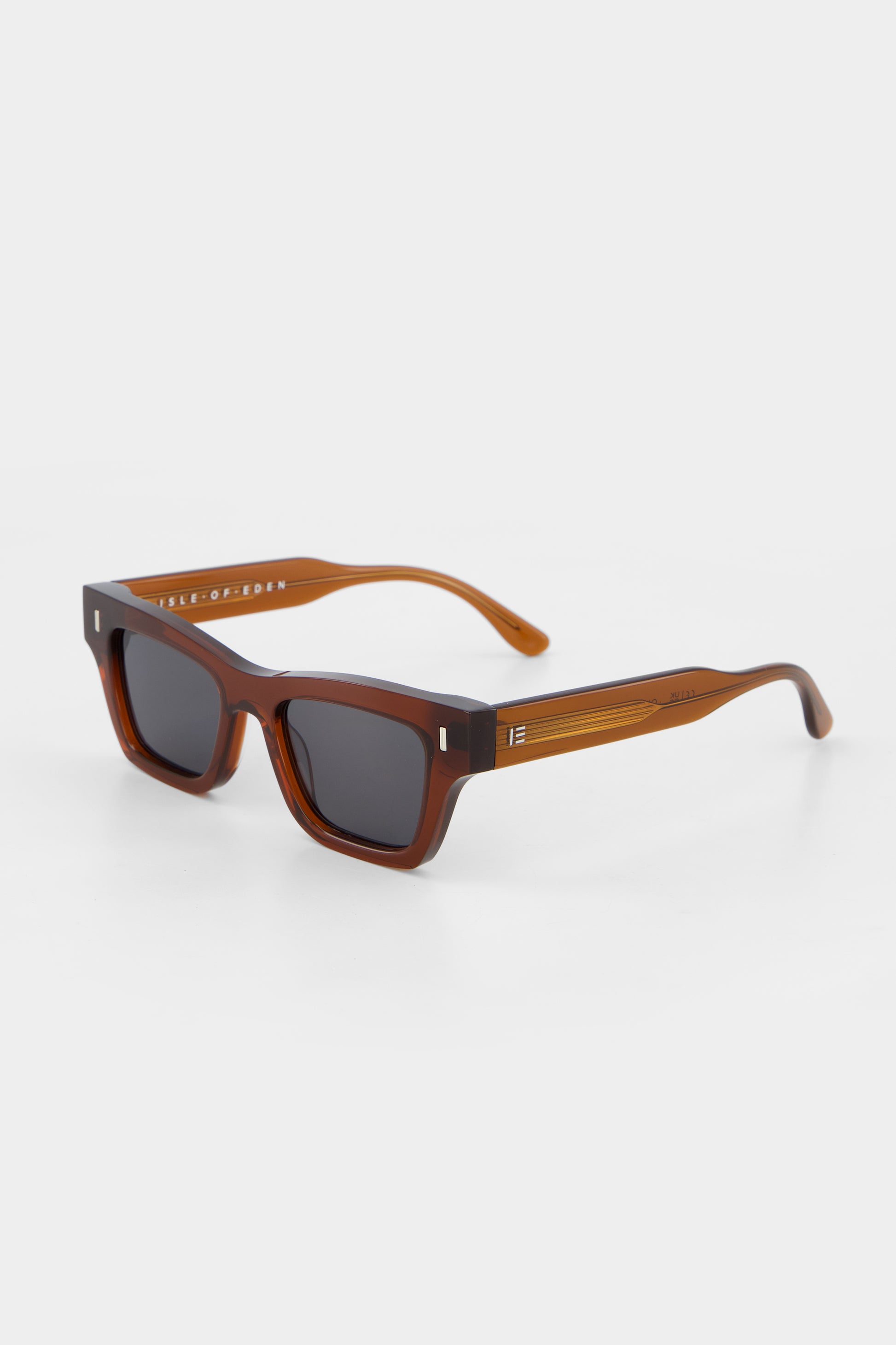 Isle of Eden Olli brown sunglasses, three-quarter angle showing low-profile art-deco frame