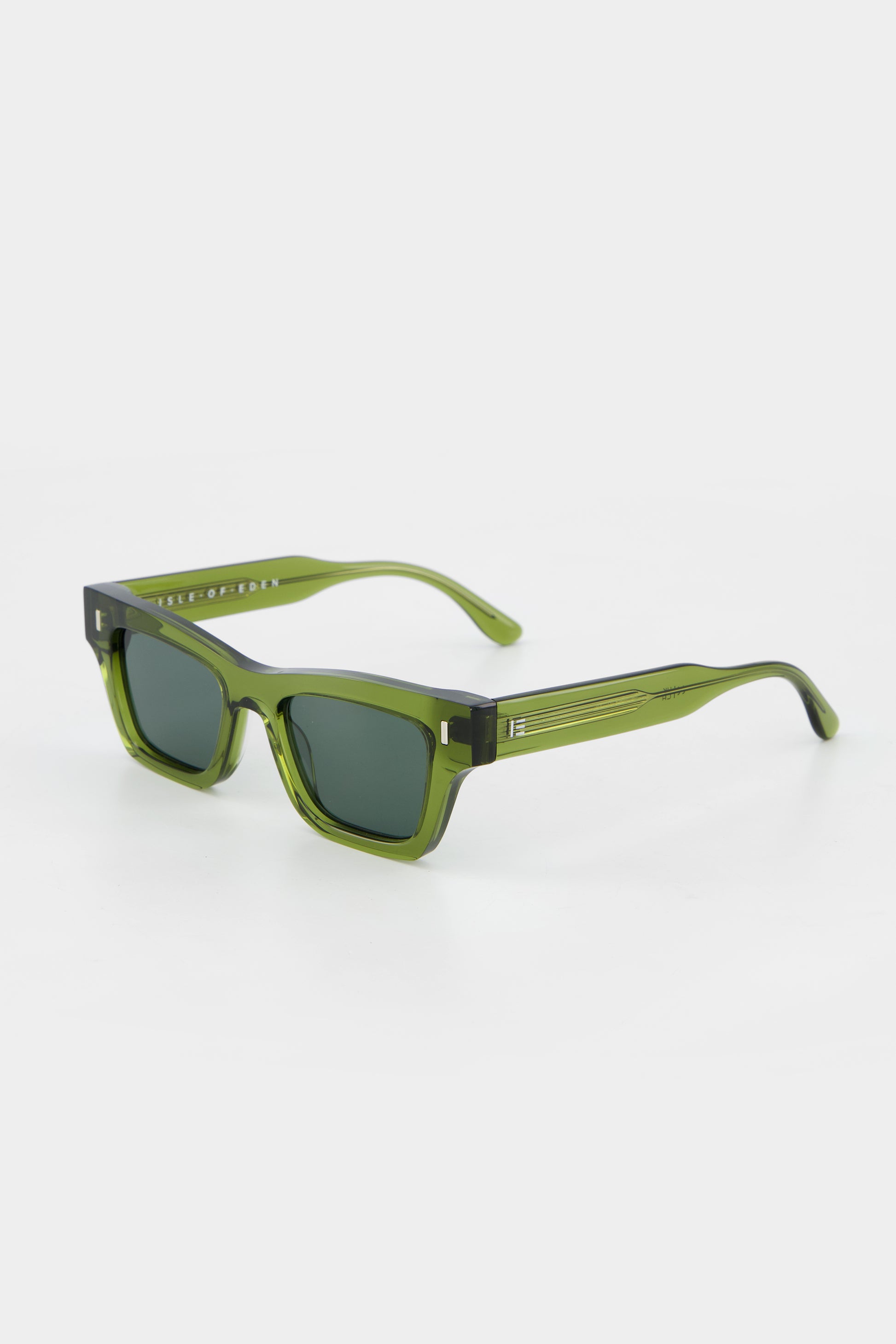 Isle of Eden Olli bottle green sunglasses, three-quarter angle showing low-profile art-deco frame