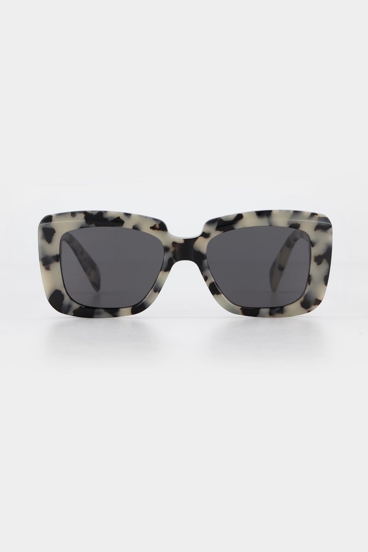 Isle of Eden Pia white tortoise sunglasses, front view showing bold rectangular frame and dark lenses