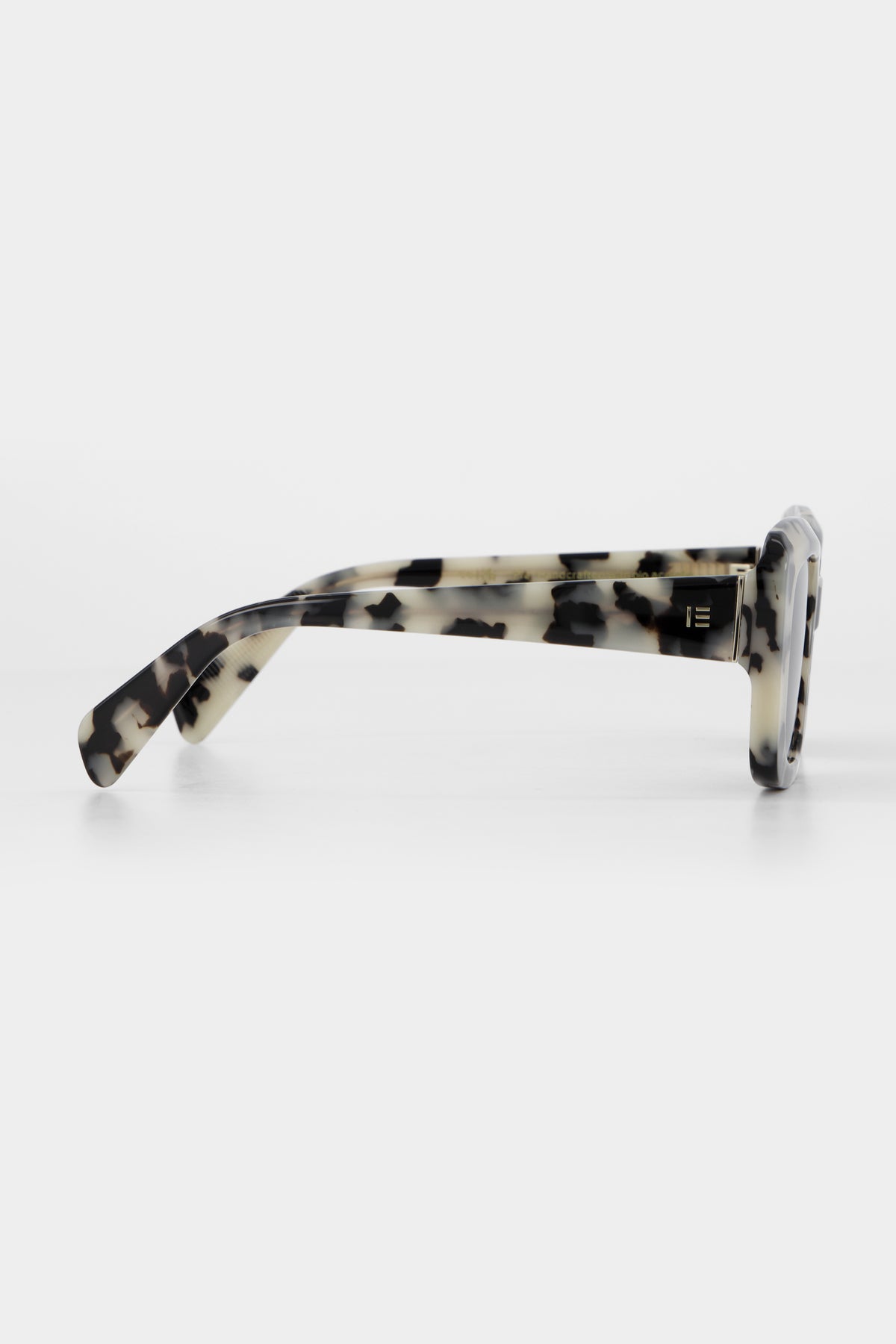 Isle of Eden Pia white tortoise sunglasses, side profile view showing temple length and hinge detail