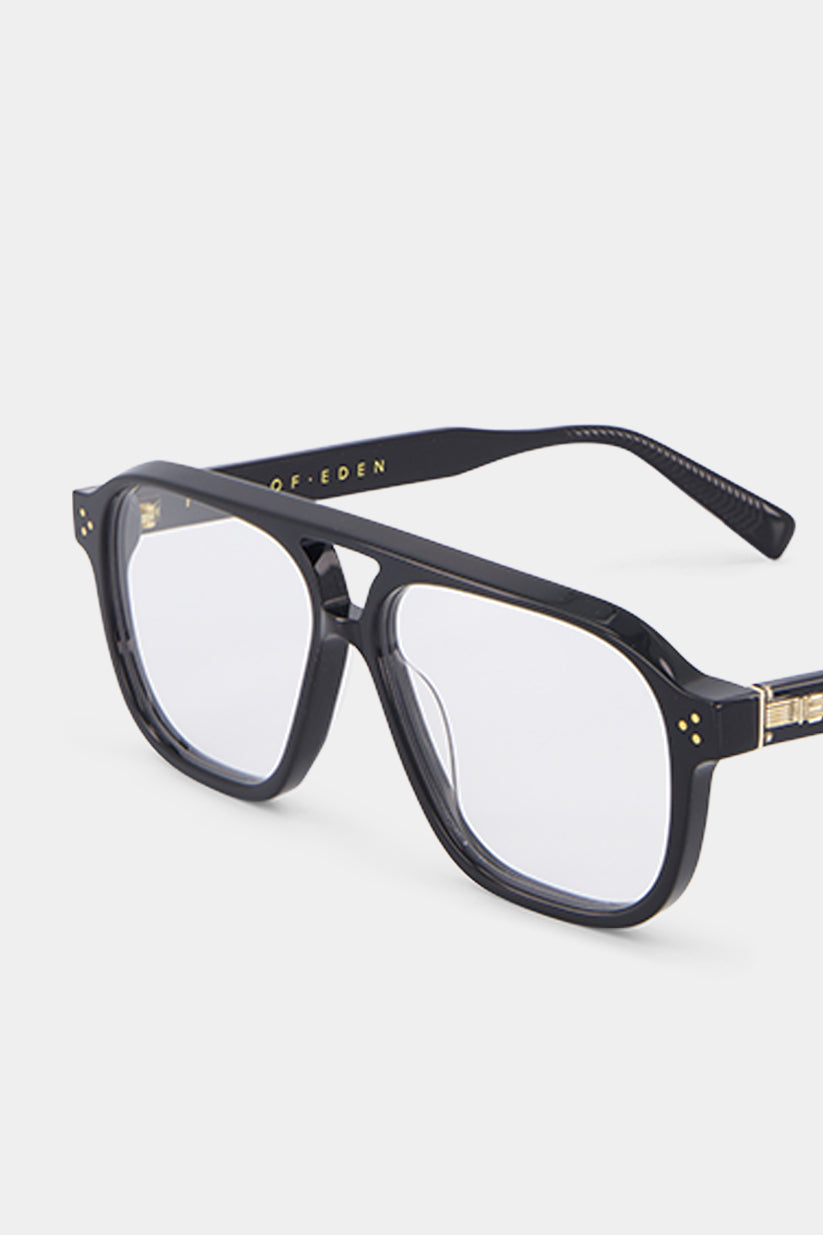 Isle of Eden Remi prescription glasses, angled front view showing the eco-conscious black bio-acetate frame with gold-tone hinge detail