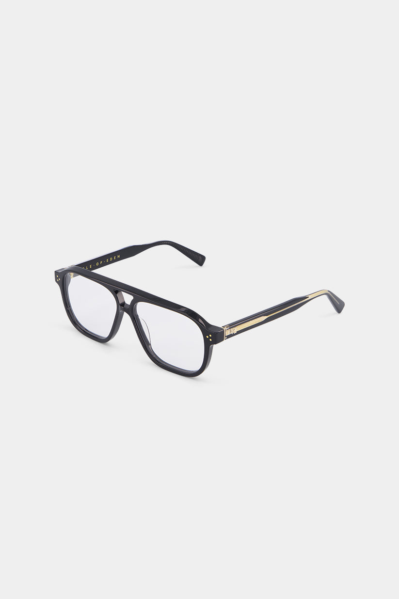 Isle of Eden Remi prescription glasses, side zoom view showing the eco-conscious black bio-acetate temple with gold-tone metal accent