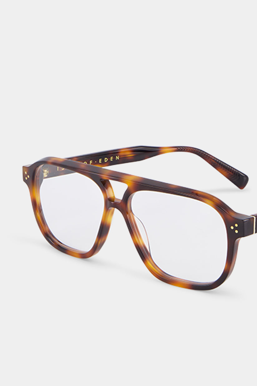Isle of Eden Remi prescription glasses, angled front view showing the eco-conscious bio-acetate tortoiseshell frame with gold rivet detailing