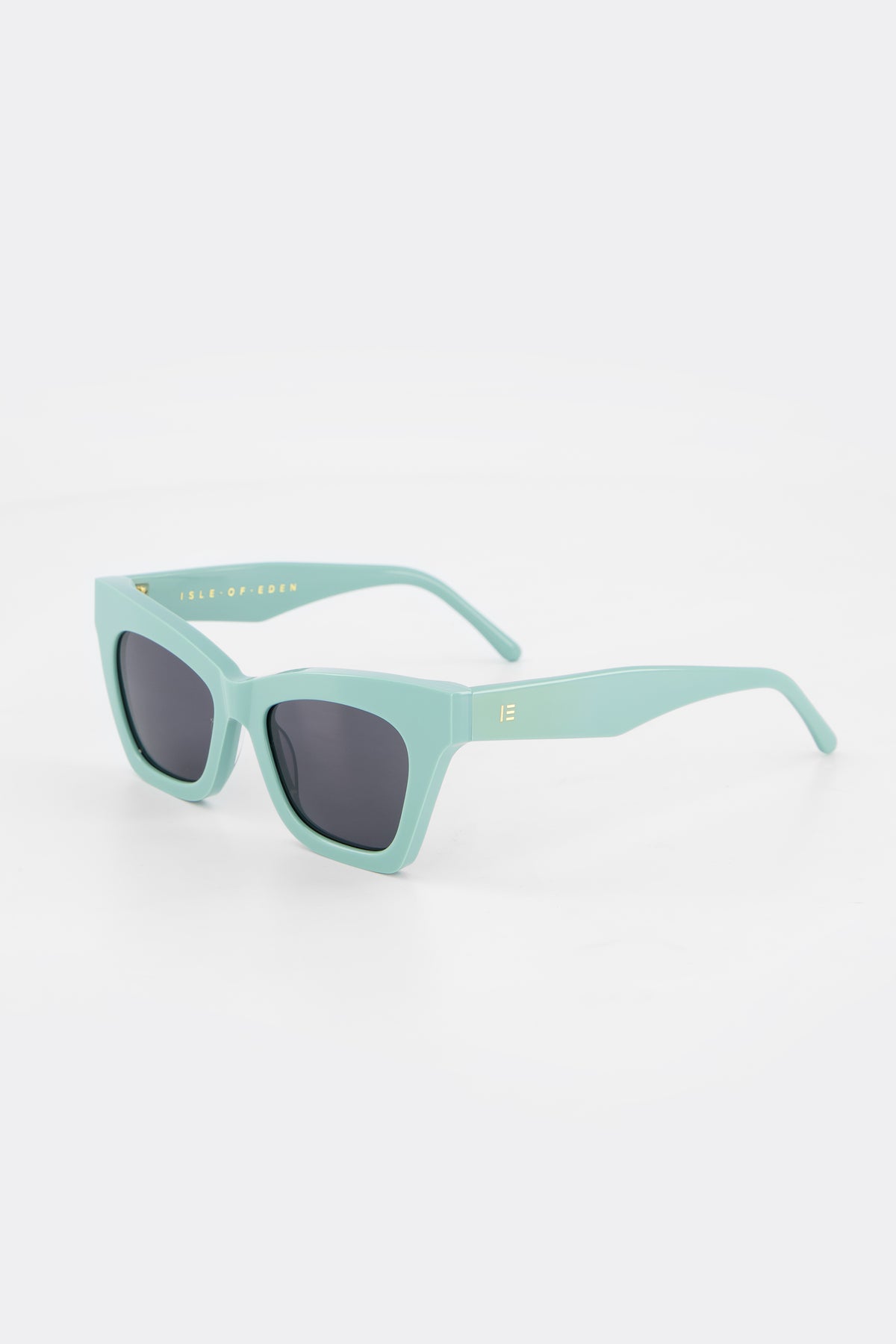 Isle of Eden Sienna mint sunglasses, three-quarter angle showing angular cat-eye frame