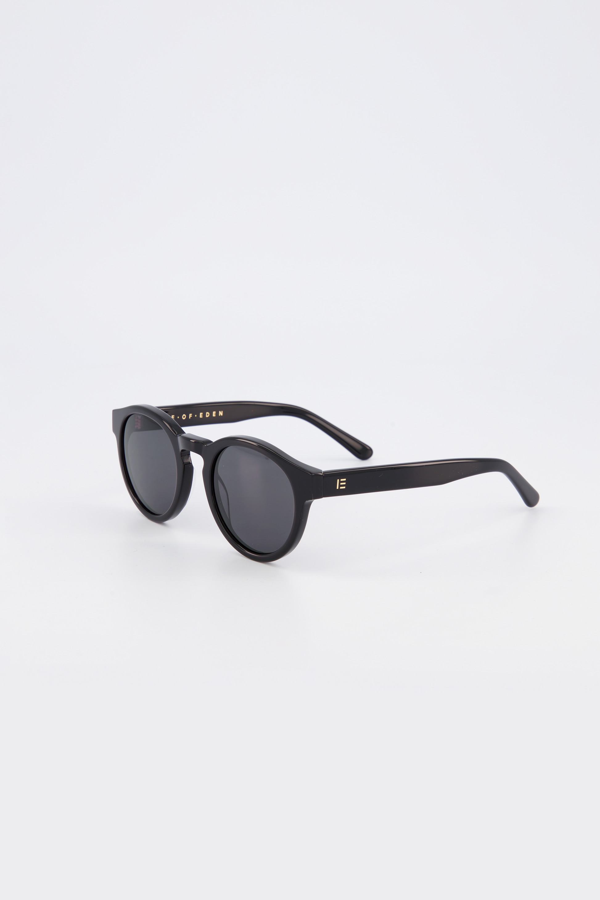 Isle of Eden Eddie black sunglasses, three-quarter angle showing round frame