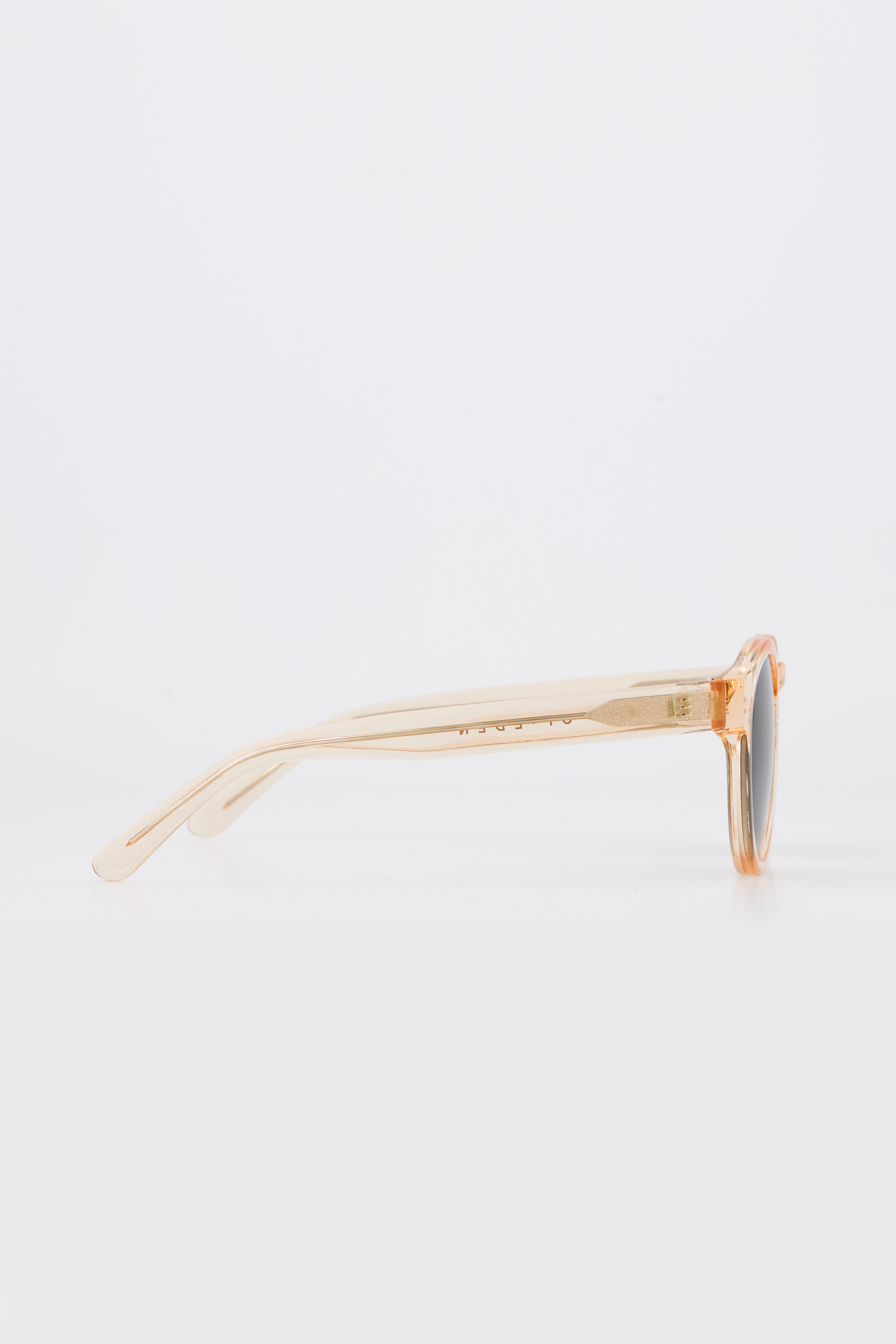 Isle of Eden Eddie champagne sunglasses, side profile view showing temple length and hinge detail