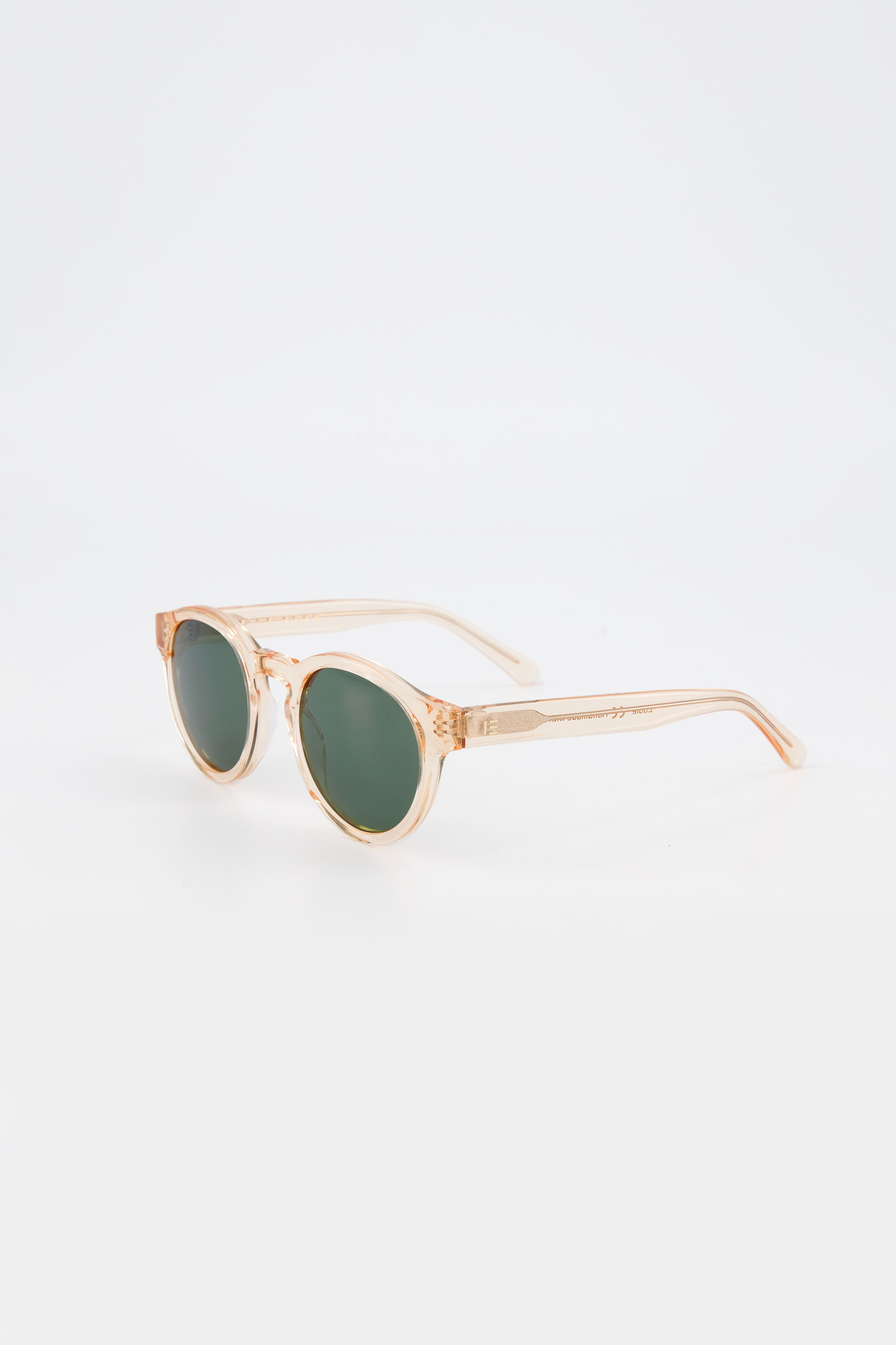 Isle of Eden Eddie champagne sunglasses, three-quarter angle showing round frame